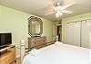 Master bedroom with a king size bed 