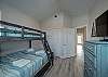 Fourth bedroom on the third floor with twin over full size bunk bed and twin trundle 