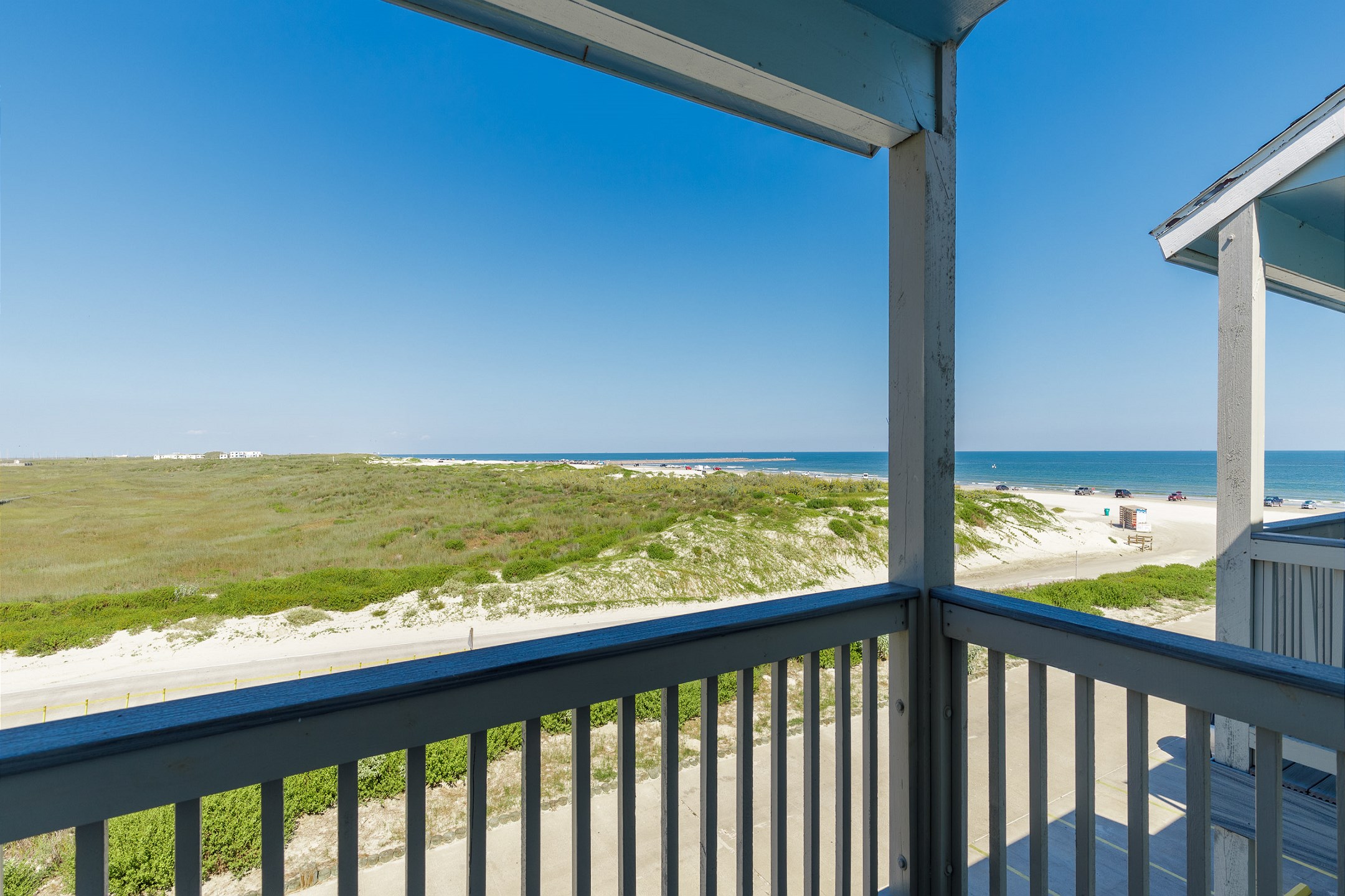 Private balcony off the master bedroom with a great view of the coastal dunes, beach, and Gulf of Mexico