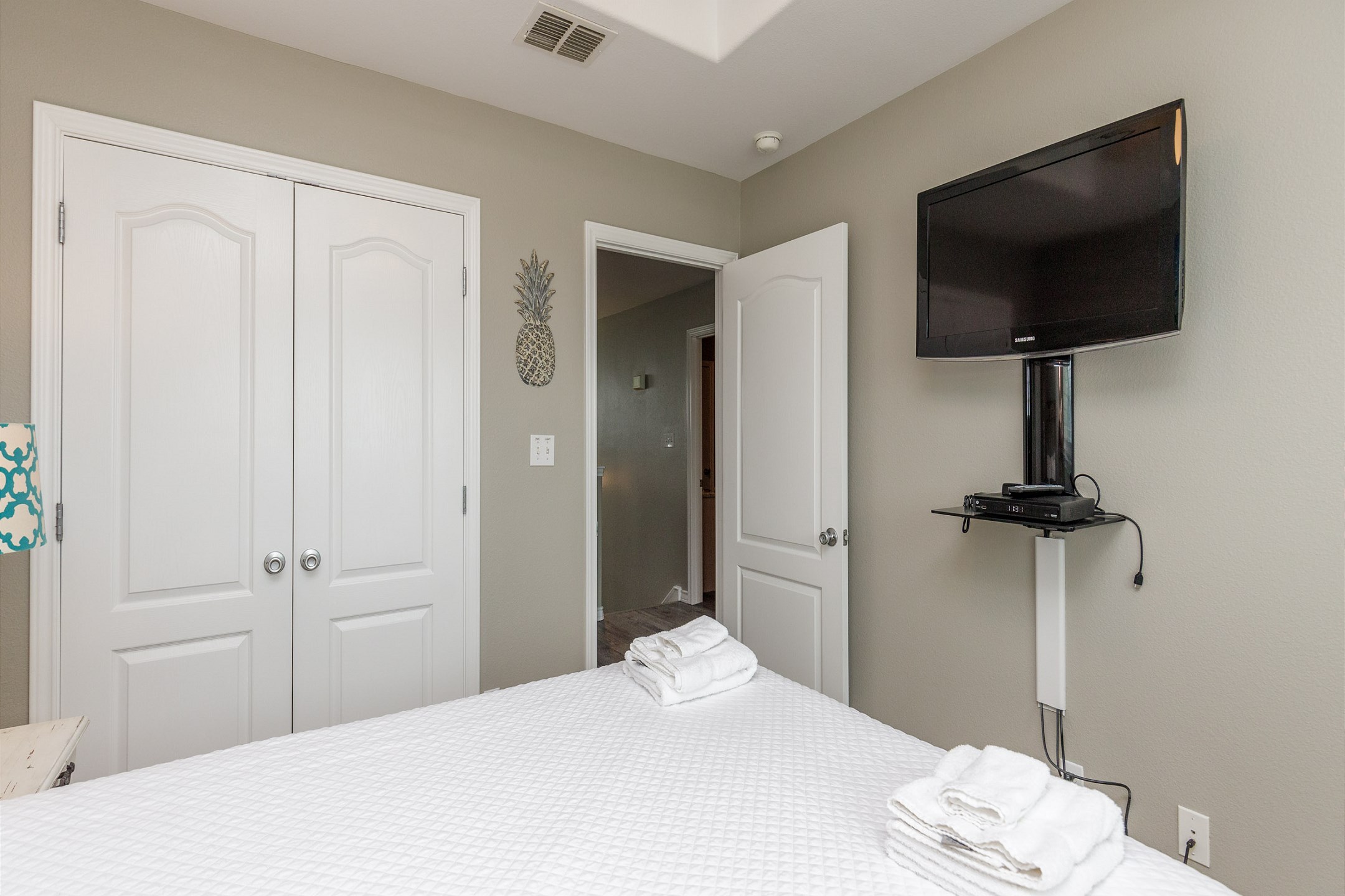 Second bedroom on the second floor with queen size bed and flat screen TV