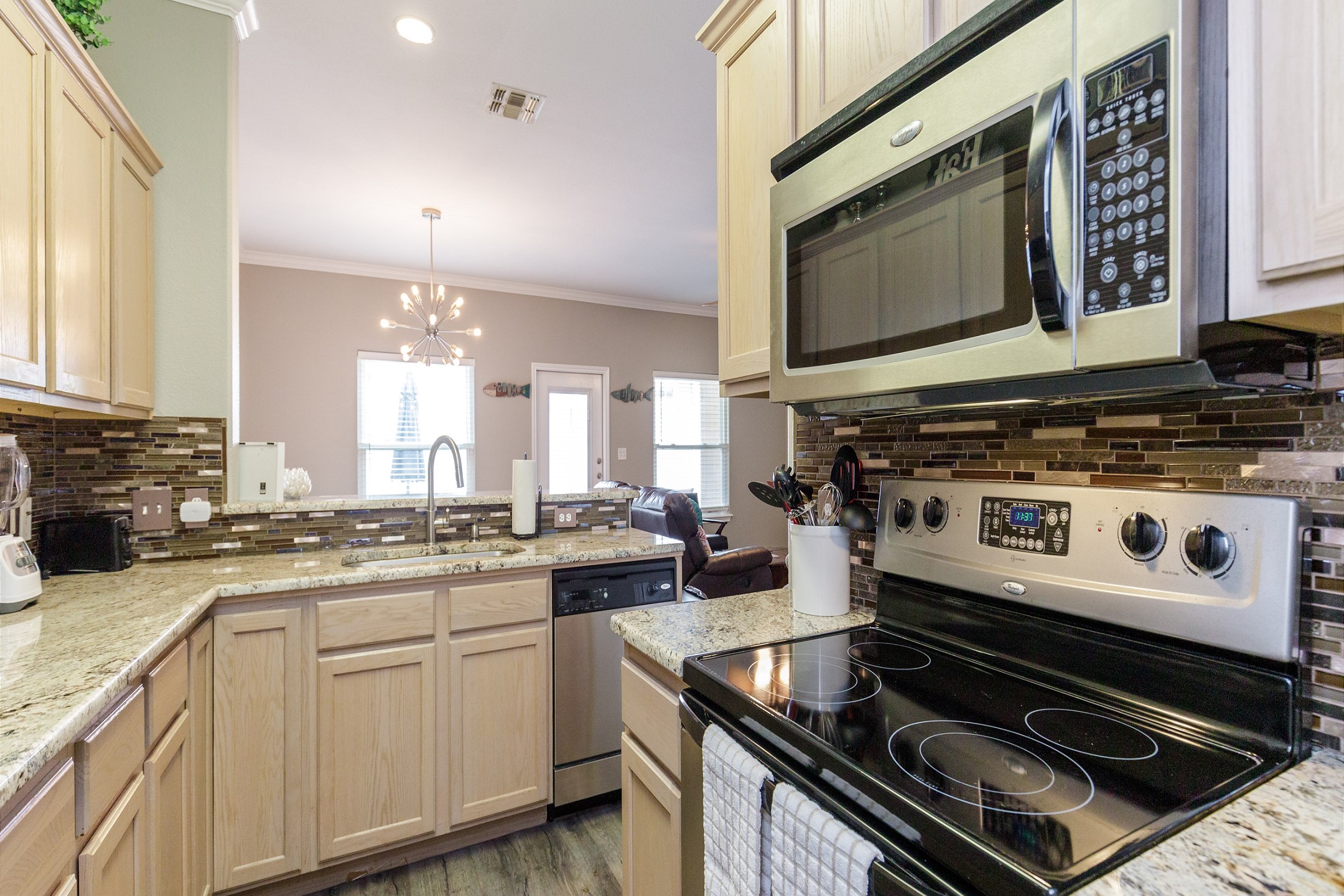 Cookware, utensils, and dinnerware for guest use