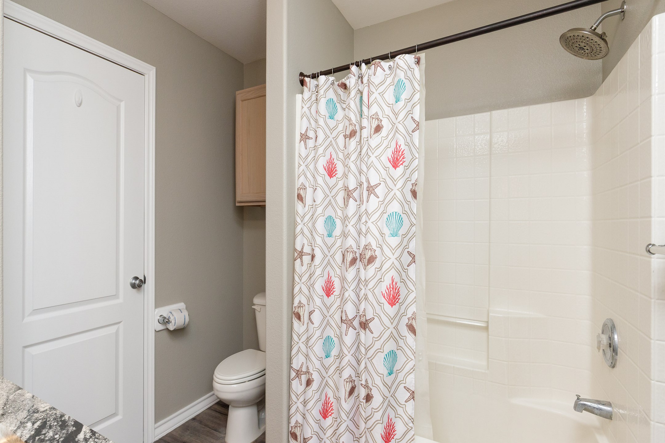 Guest bathroom on the second floor guest with tub and shower combo 