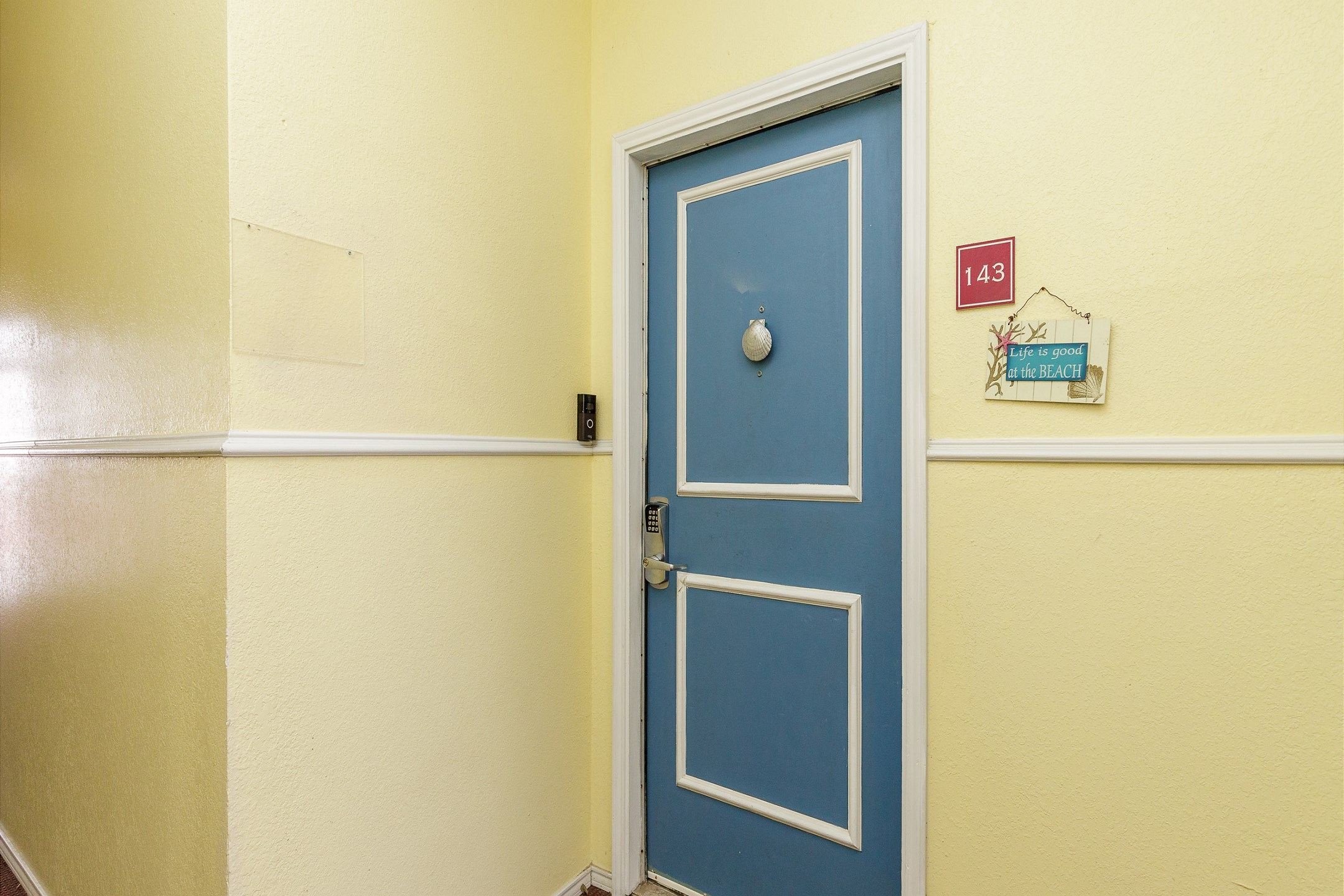Front door entrance with coded lock for added security