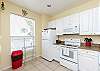 Fully equipped kitchen with plenty of counter space and storage