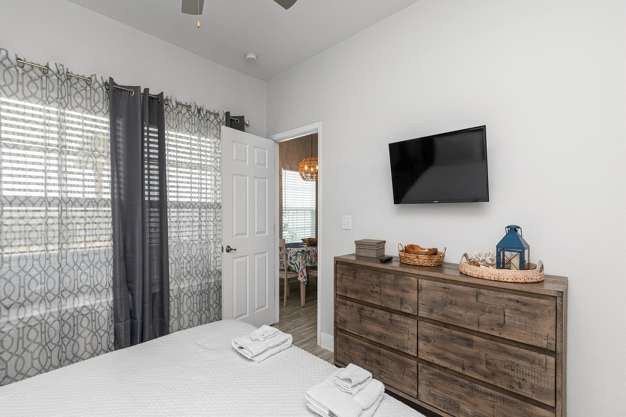 Master bedroom with king size bed, private bathroom and flat screen TV