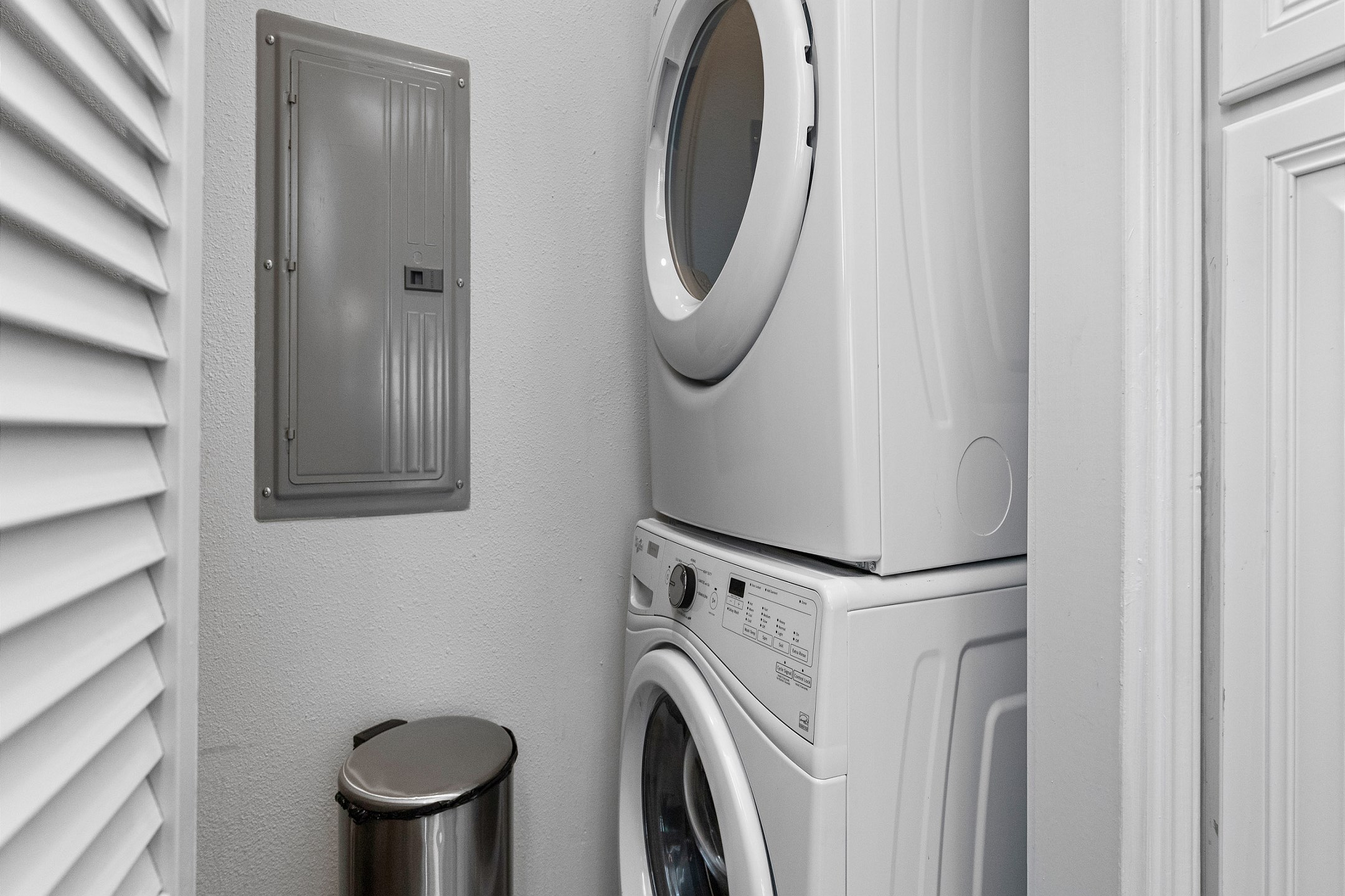 Washer and dryer next to kitchen 
