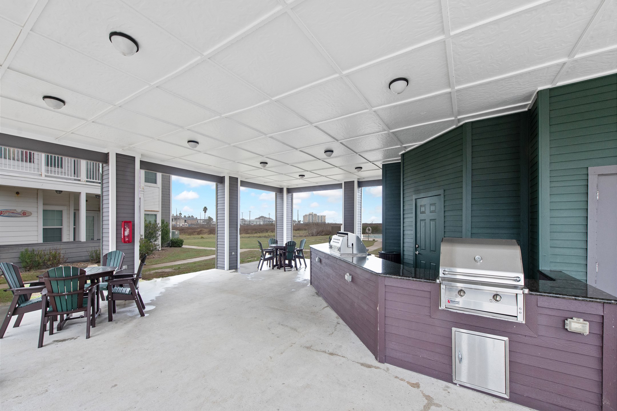 Gazebo at Pathway to the Sea with gas grills and tables for guest use