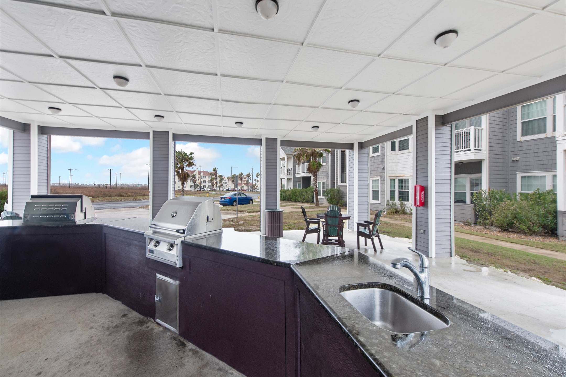 Gazebo at Pathway to the Sea with gas grills and tables for guest use
