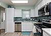 Fully equipped kitchen with updated stainless steel appliances 
