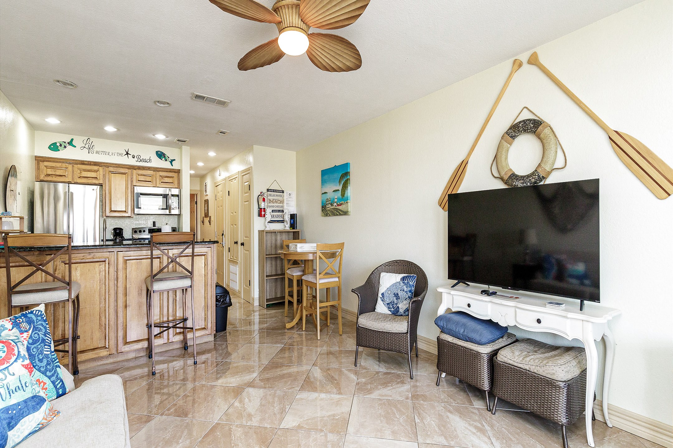 Open concept layout with new flat screen TV to enjoy from any area