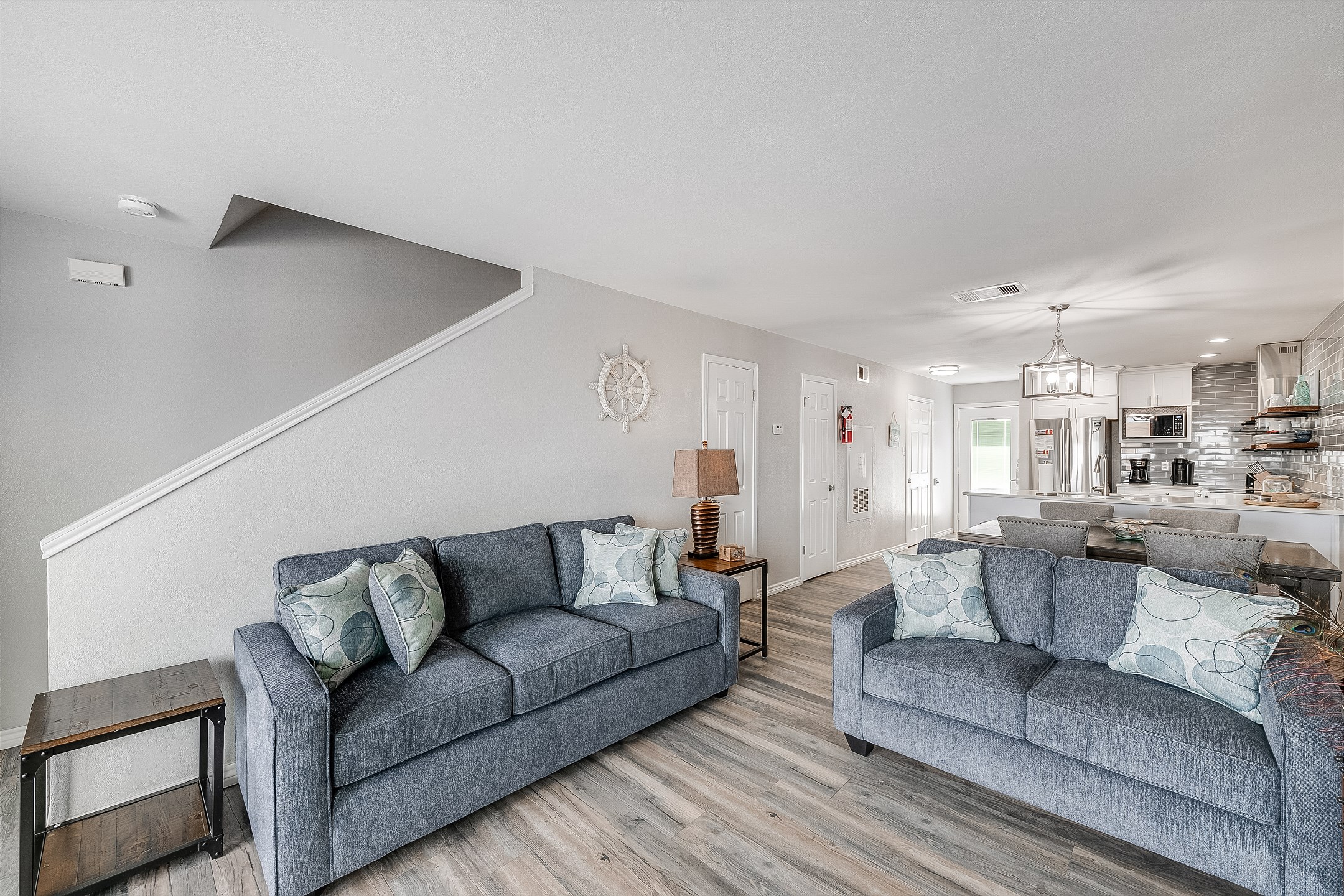 A beautifully integrated space where the living, kitchen, and dining areas come together seamlessly