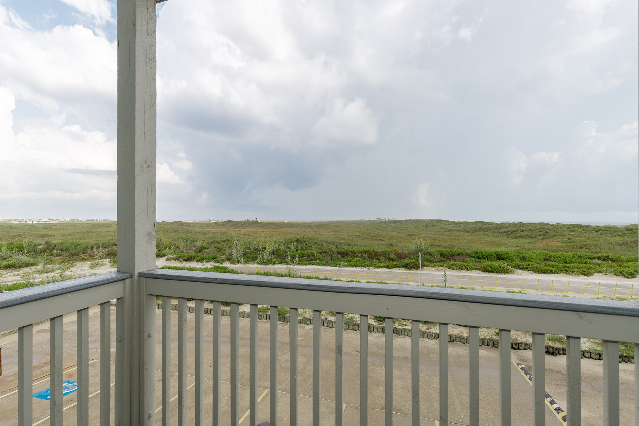 Private balcony off master bedroom with dune views