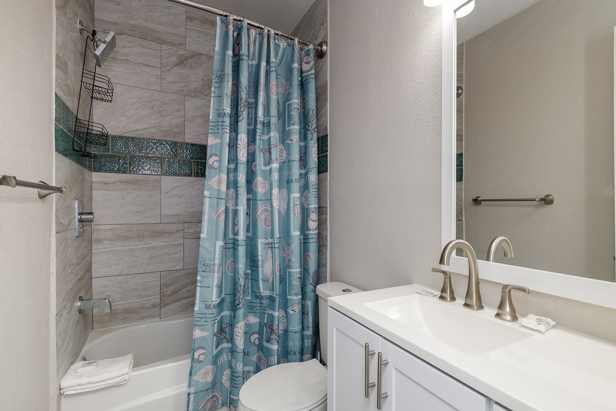 Beautiful guest bathroom with tub and shower combo