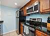 Modern kitchen with stainless steel appliances