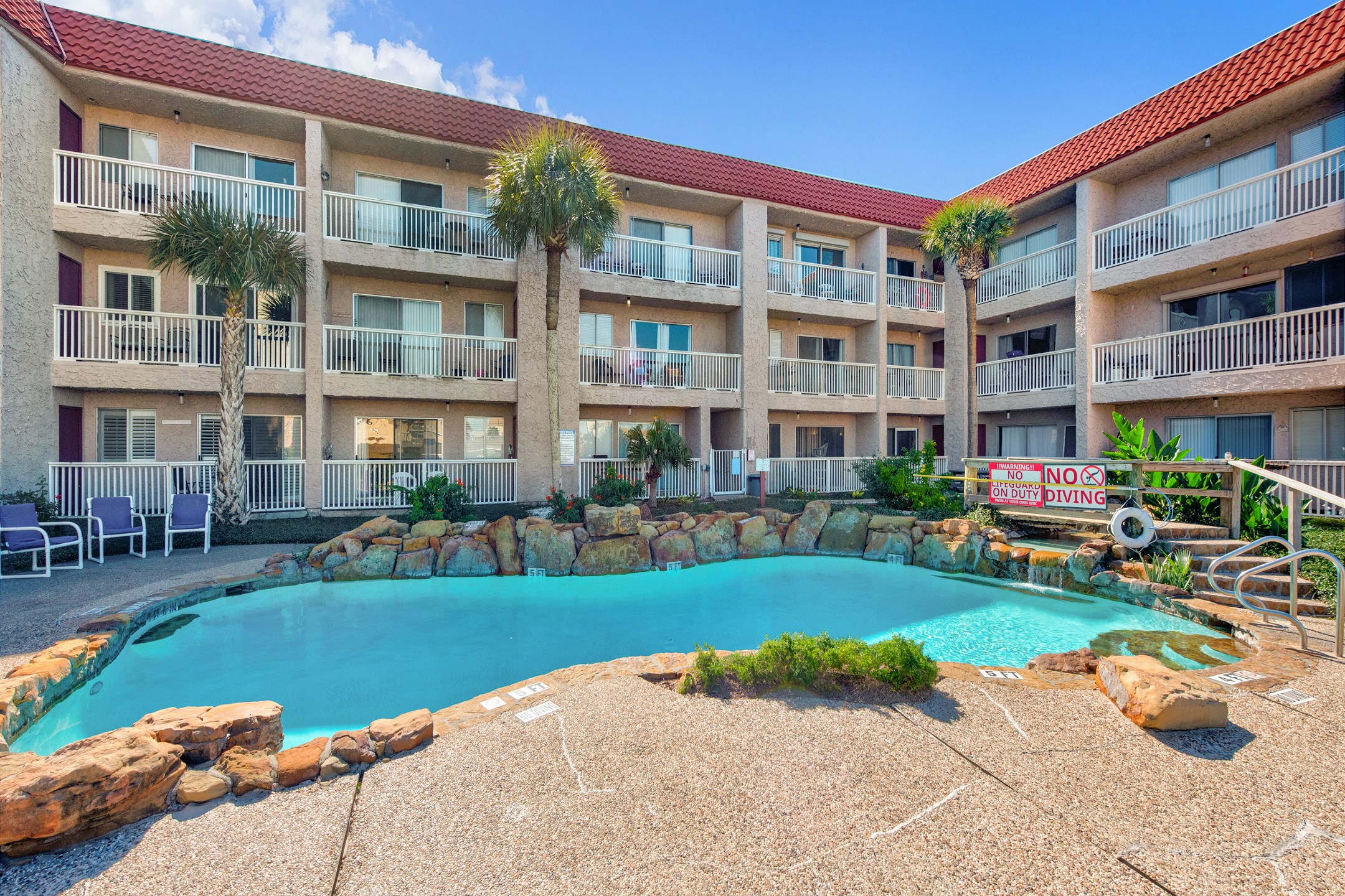 Escape the everyday and relax at our pristine pool surrounded by tropical ambiance