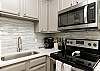 Fully equipped kitchen with stainless steel appliances, Keurig and 12-cup coffee maker 