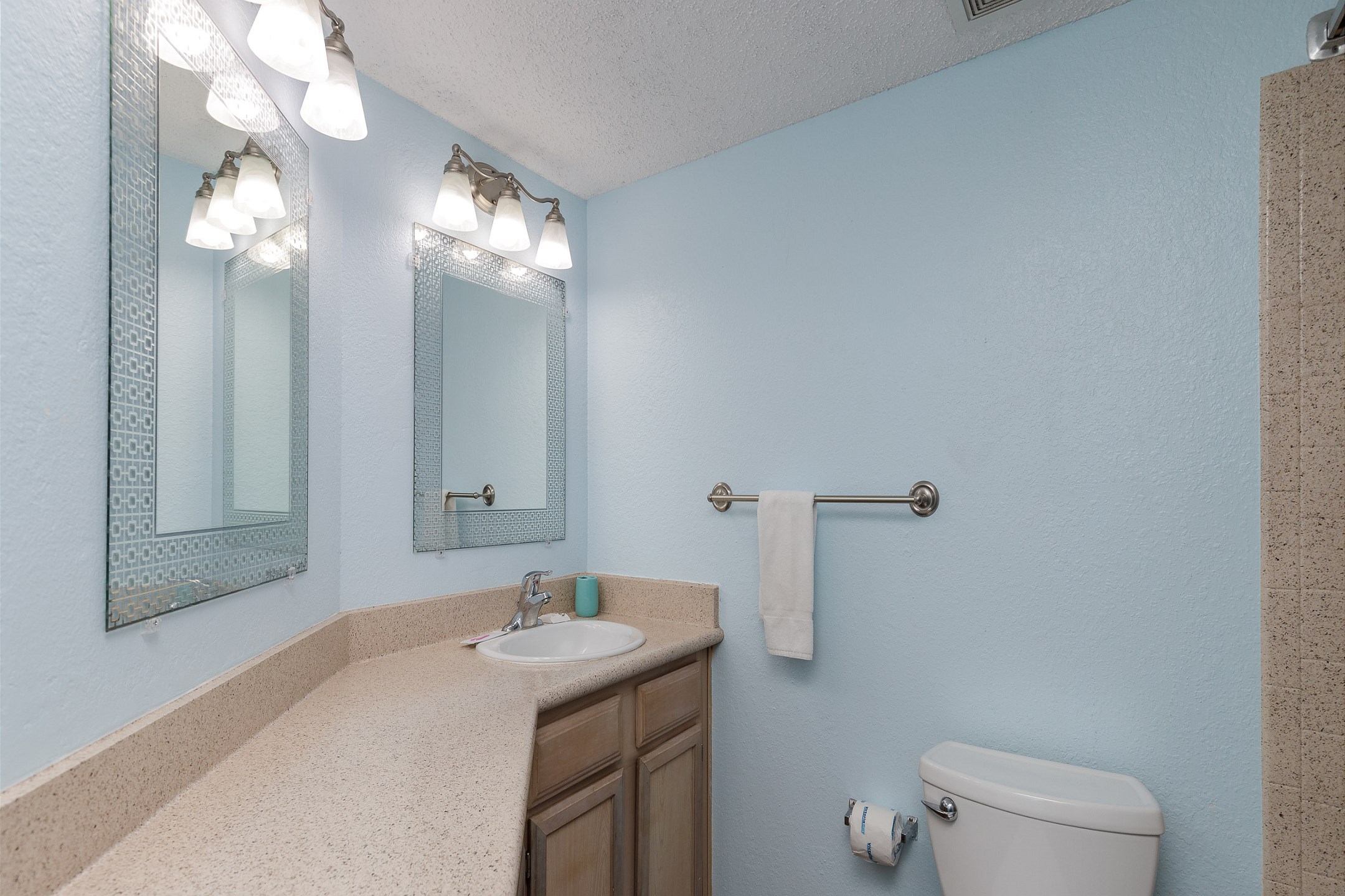 Bathroom with plenty of storage and tub/shower combo