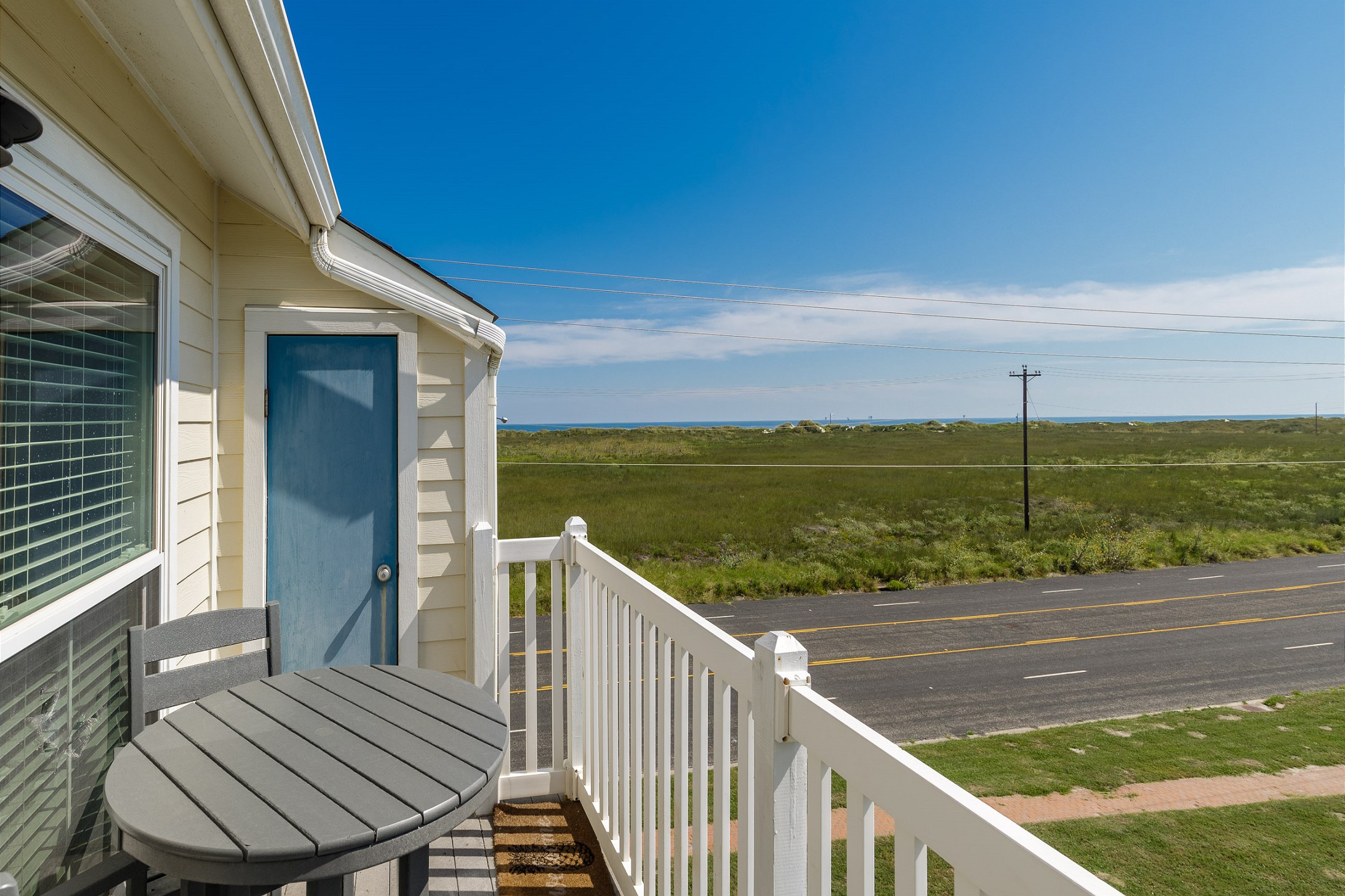 Enjoy your morning coffee with ocean breezes on your private balcony, just a short stroll from the beach