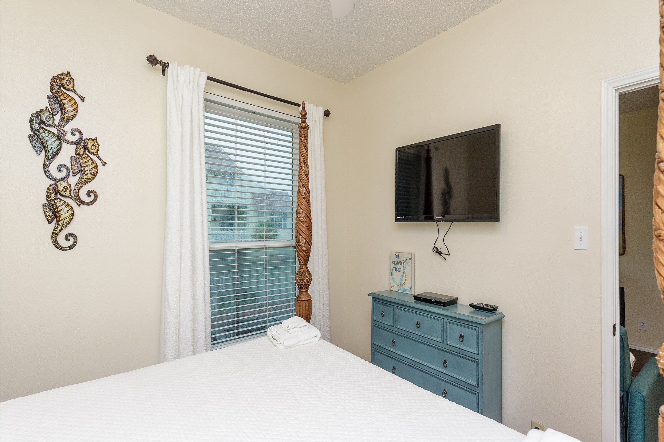 Master bedroom with king size bed and flat screen TV