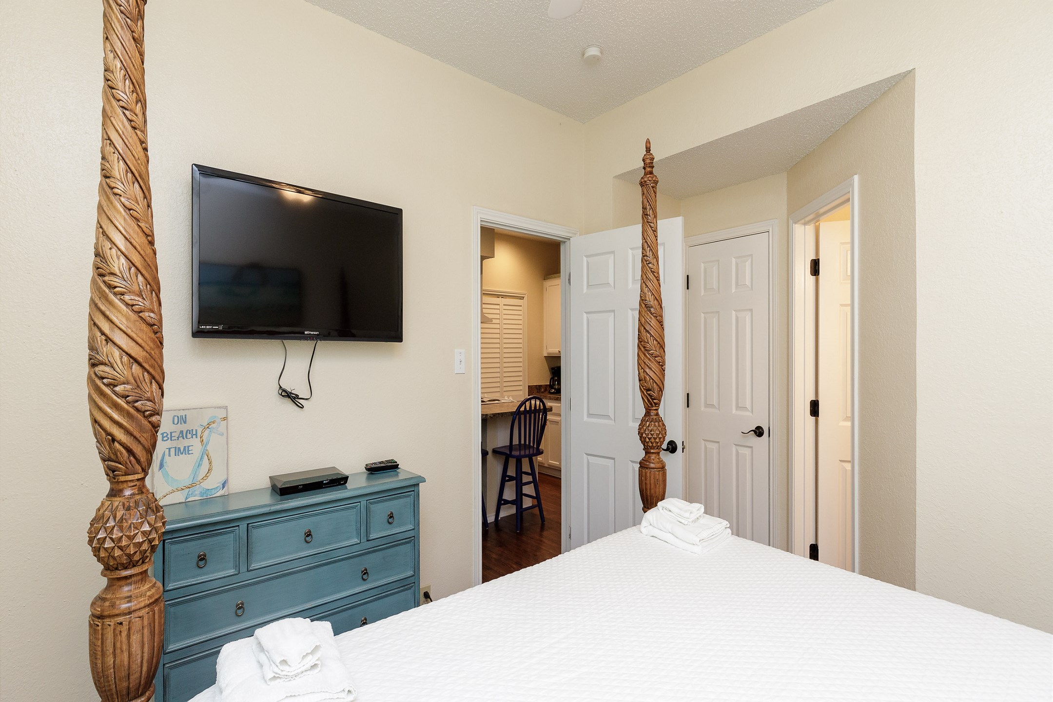 Master bedroom with king size bed and flat screen TV