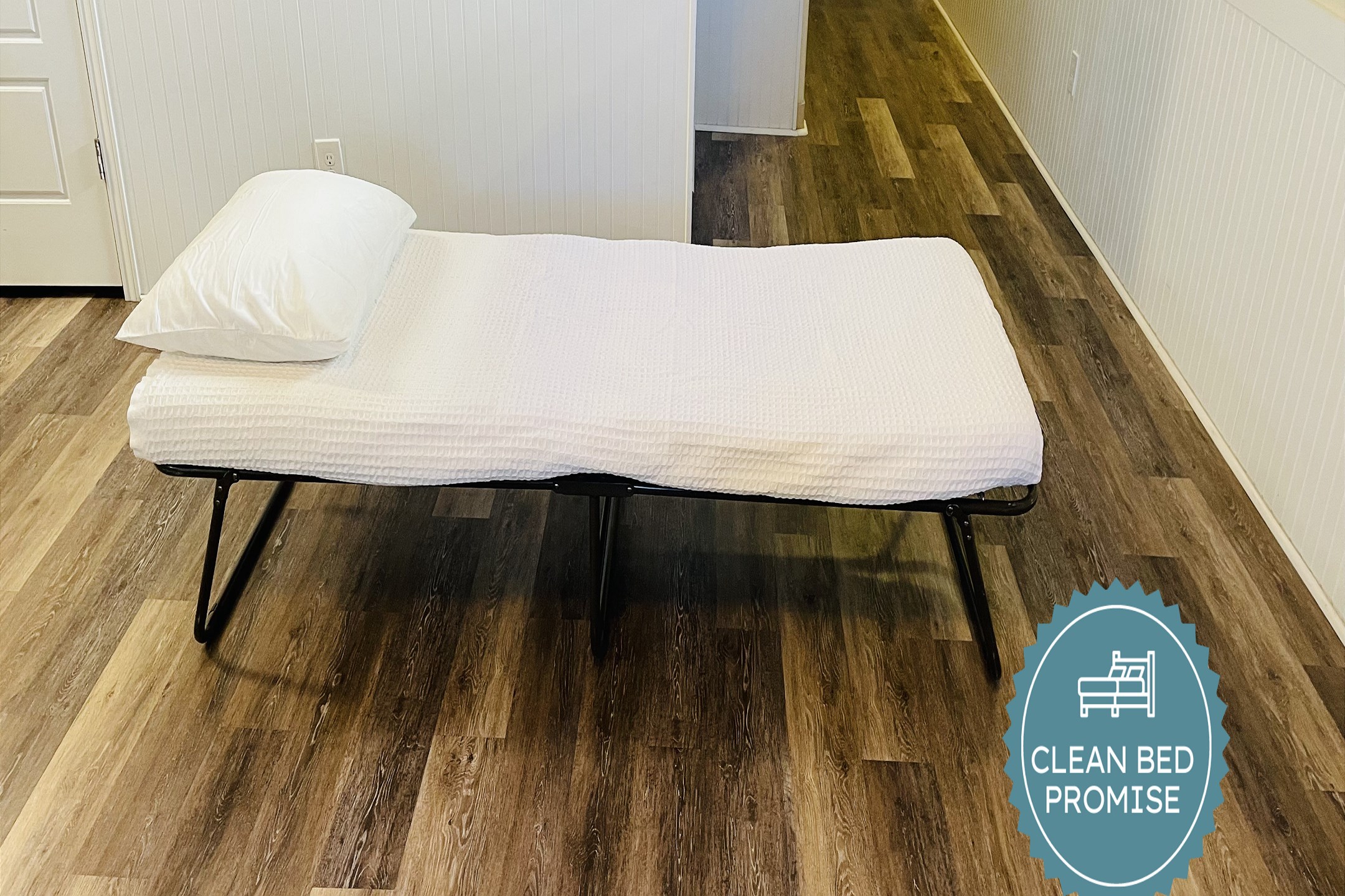 One twin roll-away bed with memory foam mattress