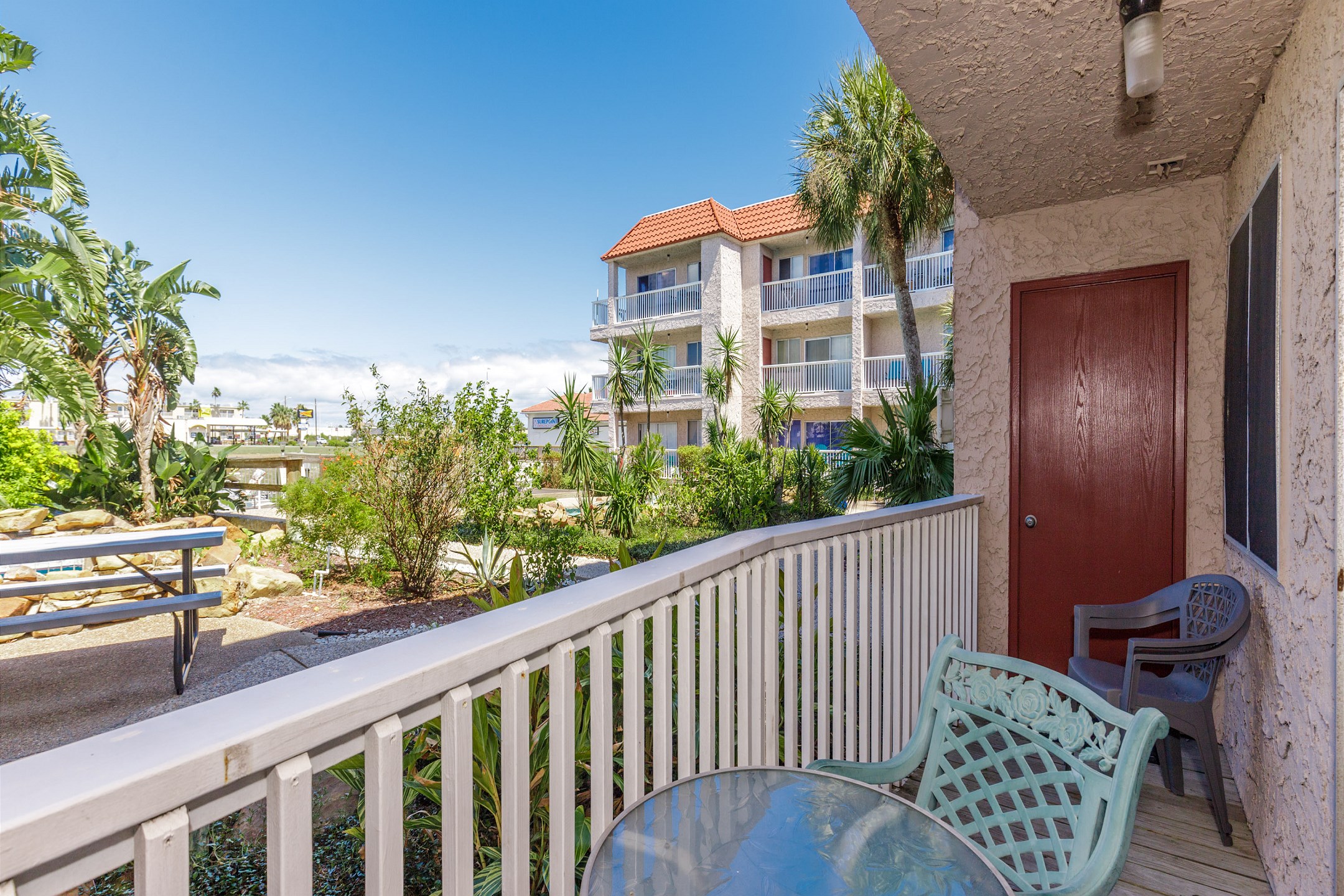 Private patio space over looking the complex courtyard 