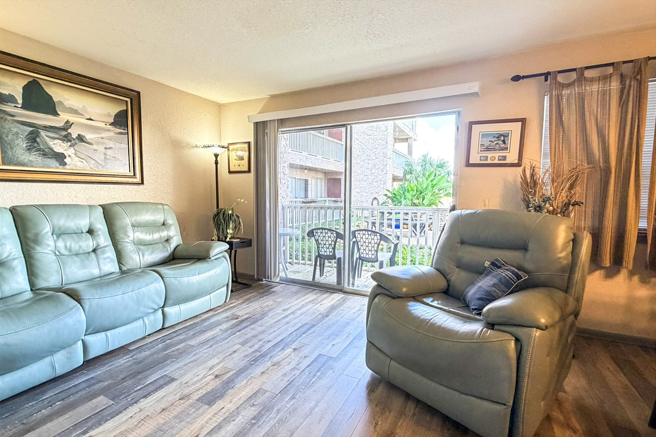 Private balcony off from living room