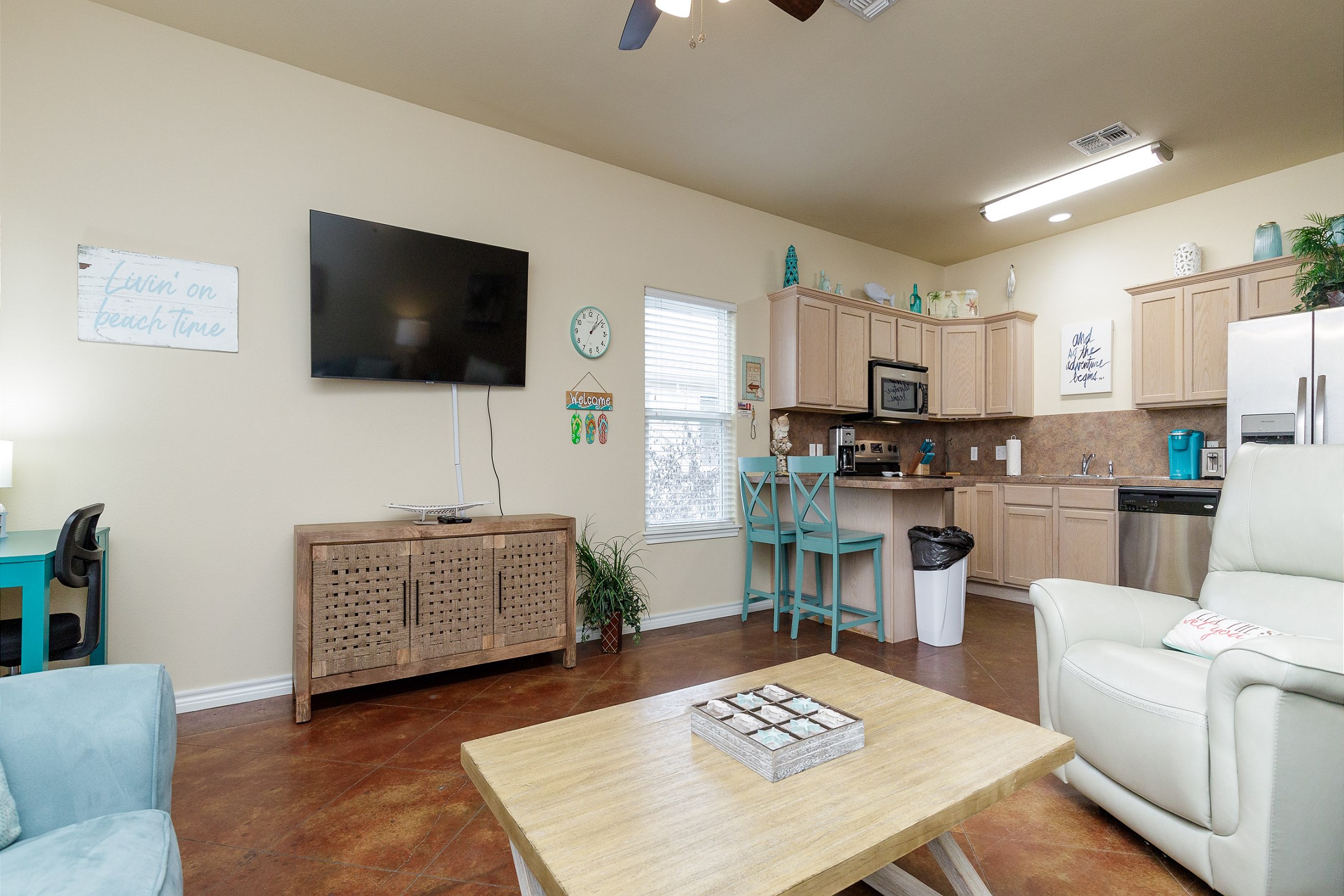 Spacious living area with comfy furniture and a new recliner