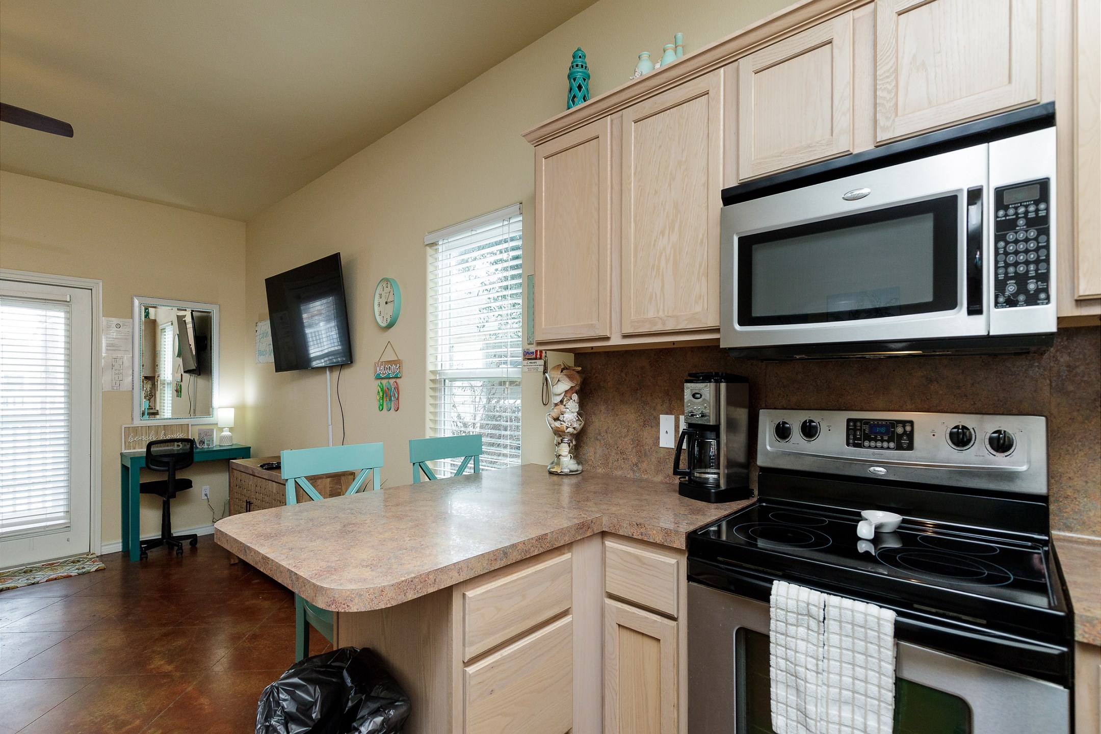 Modern kitchen with stainless steel appliances