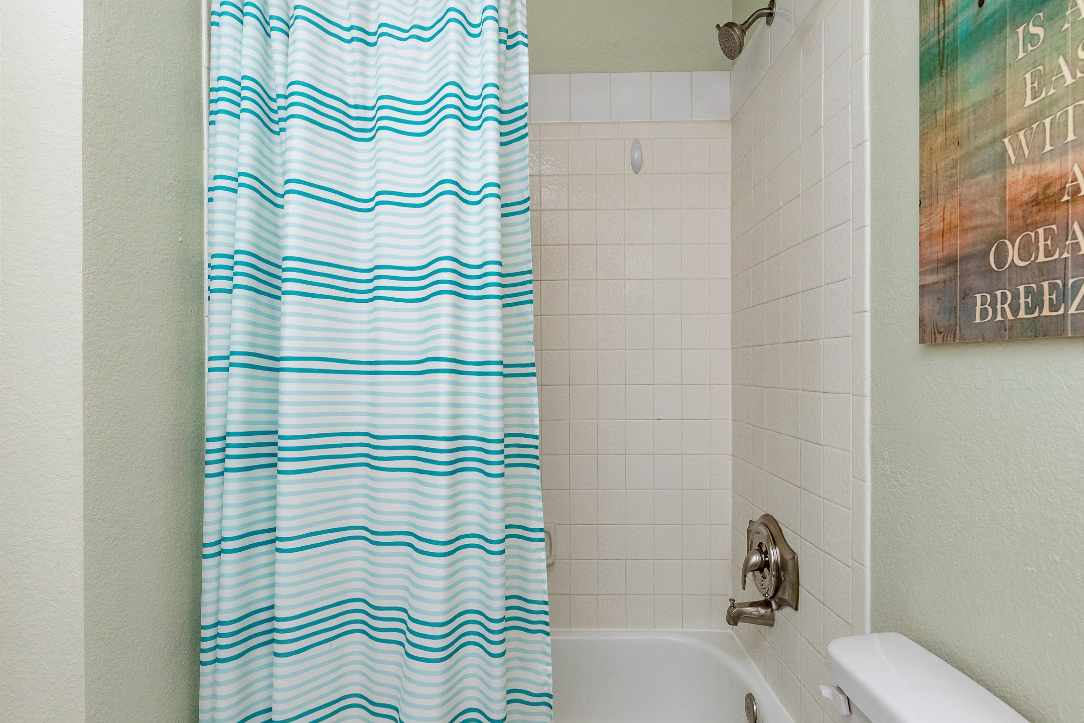 Bathroom with tub and shower