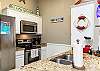 Kitchen area with Keurig and 12-cup coffee maker