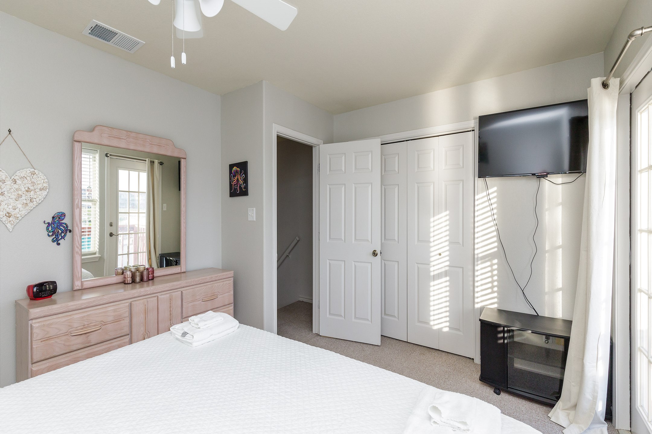 Master bedroom with king size bed, private bathroom and private balcony