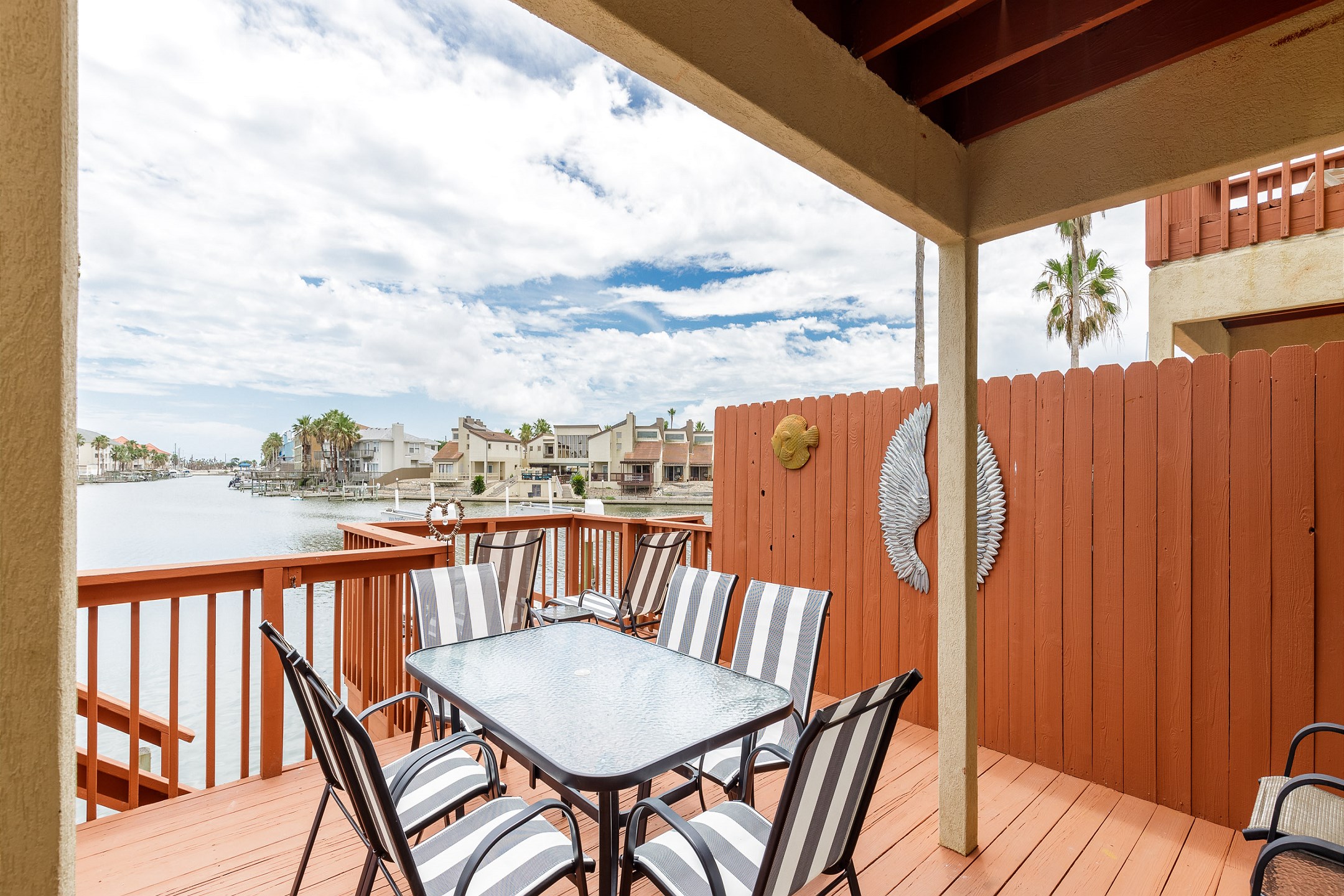 Large deck with plenty of seating to relax in and enjoy the canal views