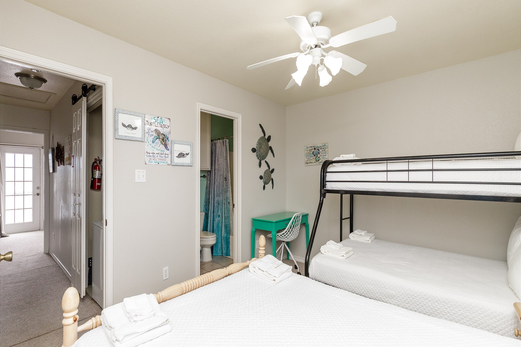 Second bedroom with queen size bed and twin over full size bunk bed along with private bathroom 
