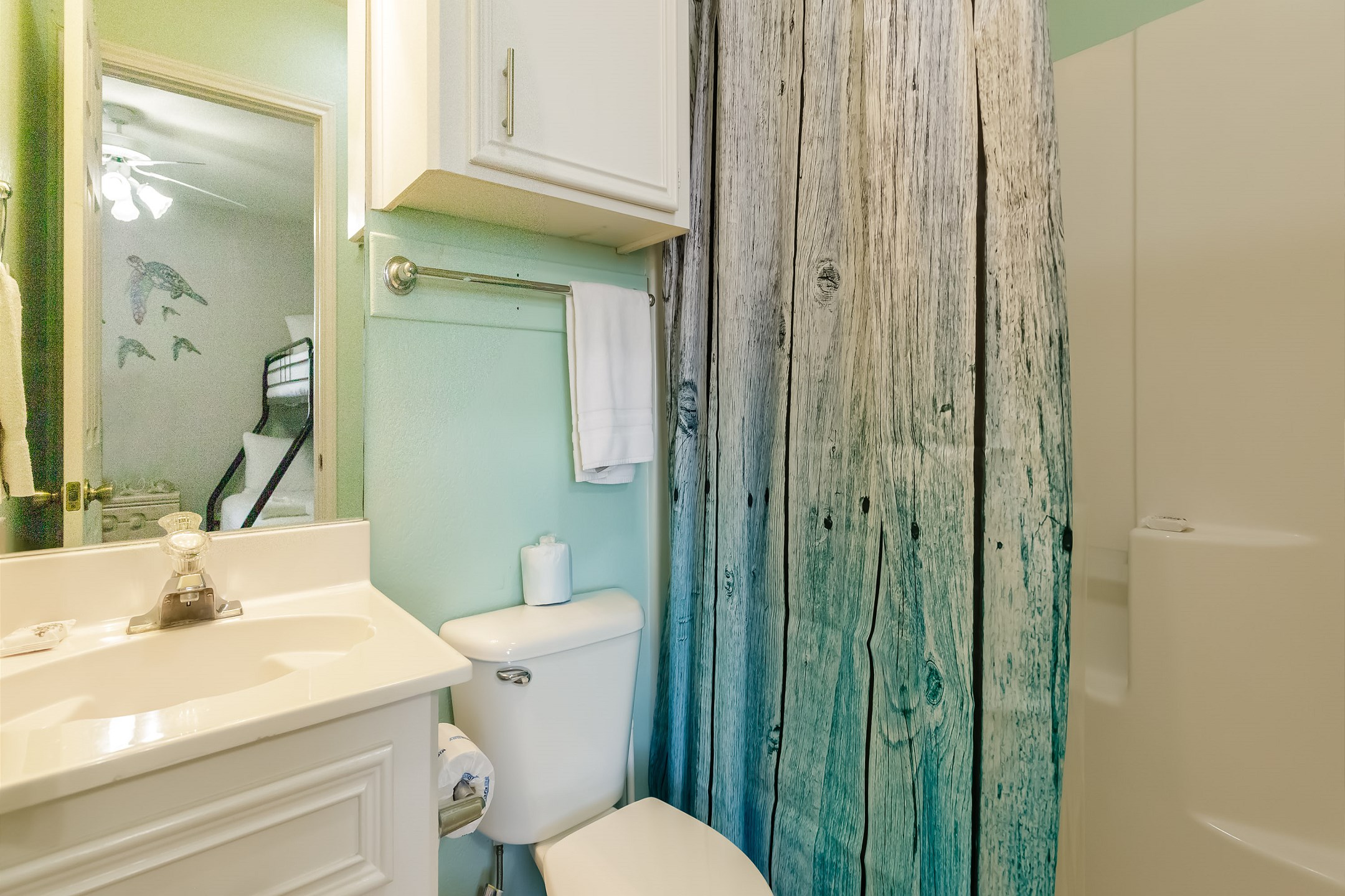 Second bathroom with tub and shower 
