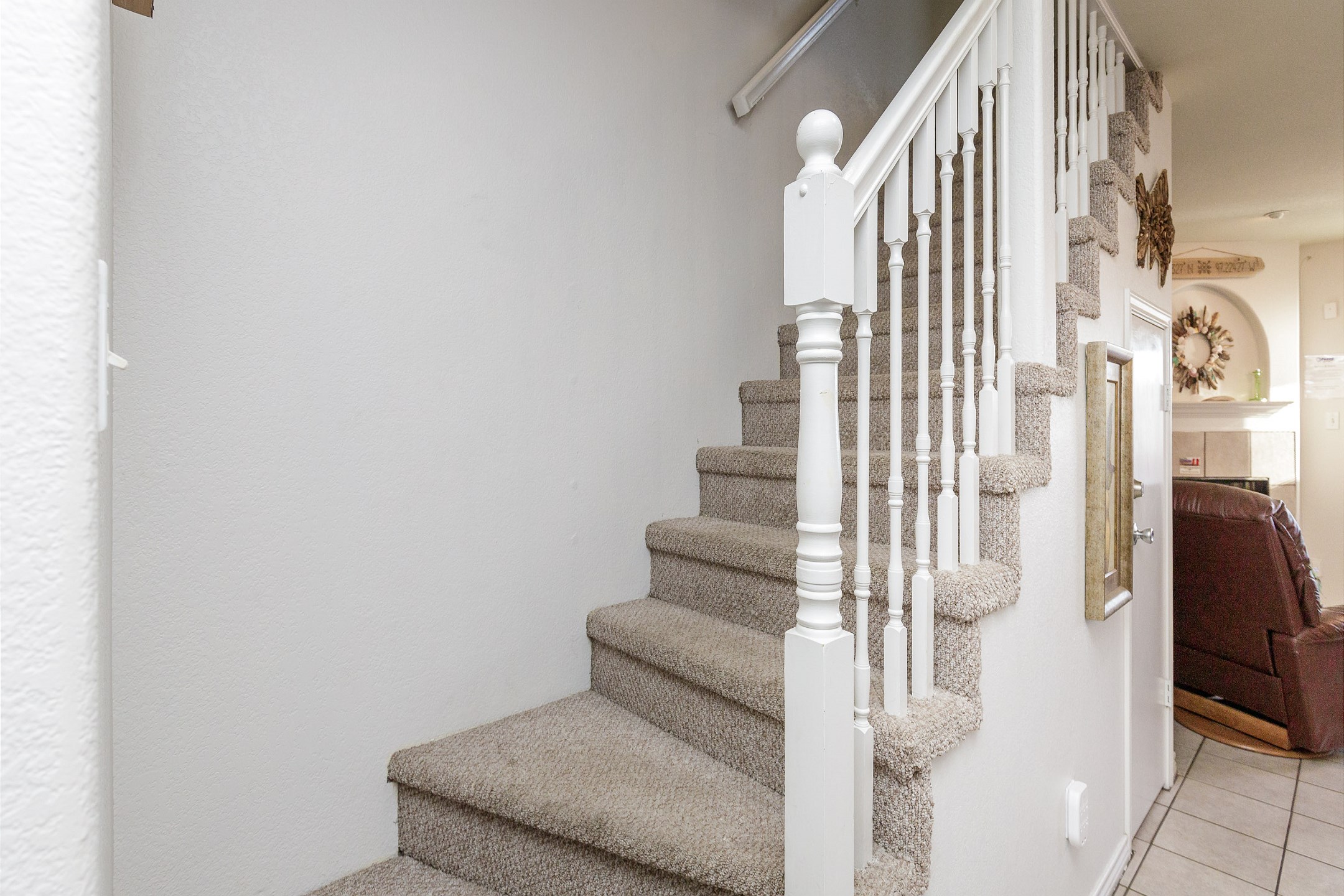 Stairs leading to the bedrooms on the second floor
