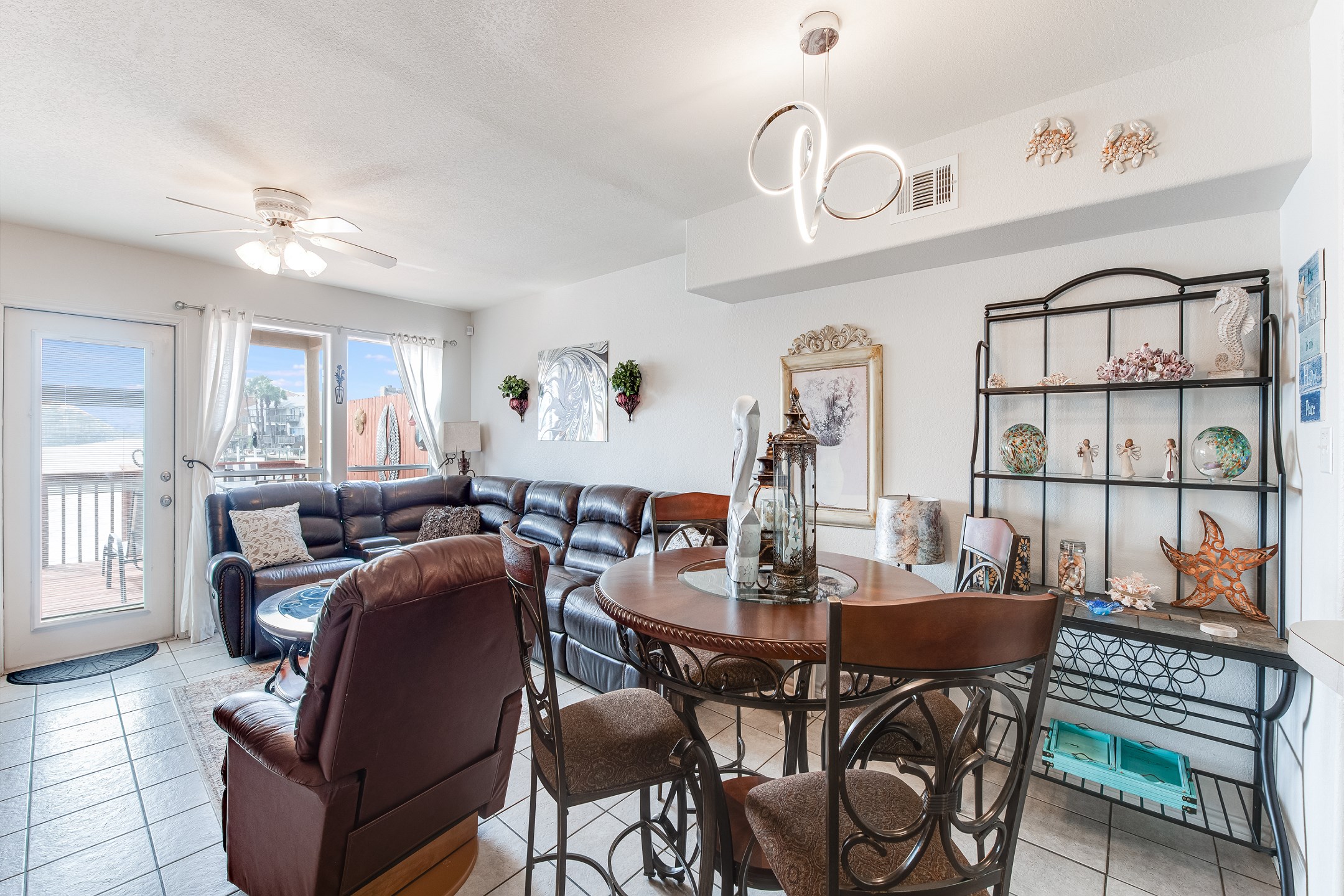 Versatile living area featuring a harmonious blend of comfort and style, ideal for both relaxation and entertaining