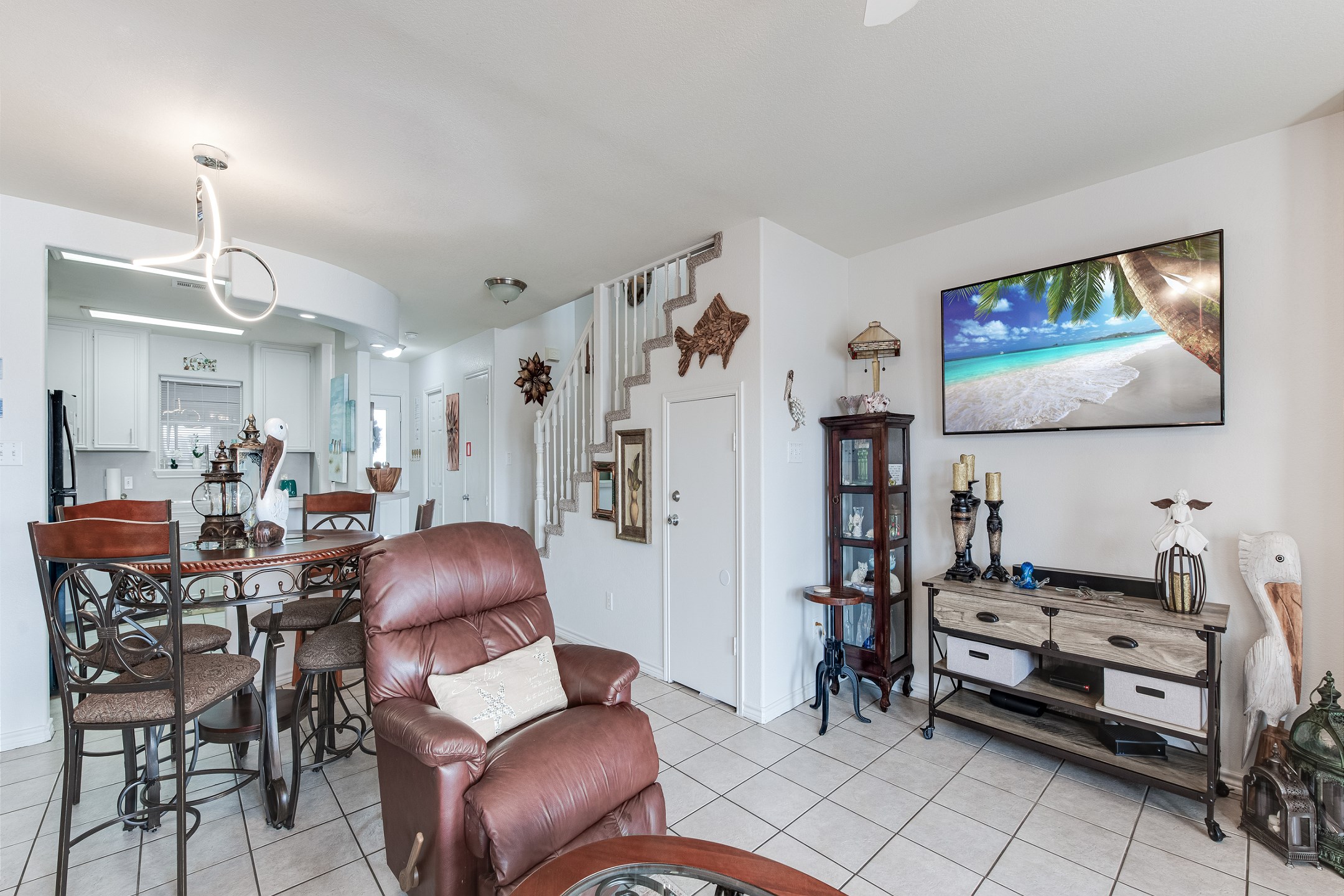 Open concept living, dining and kitchen space for family gatherings and new memories 