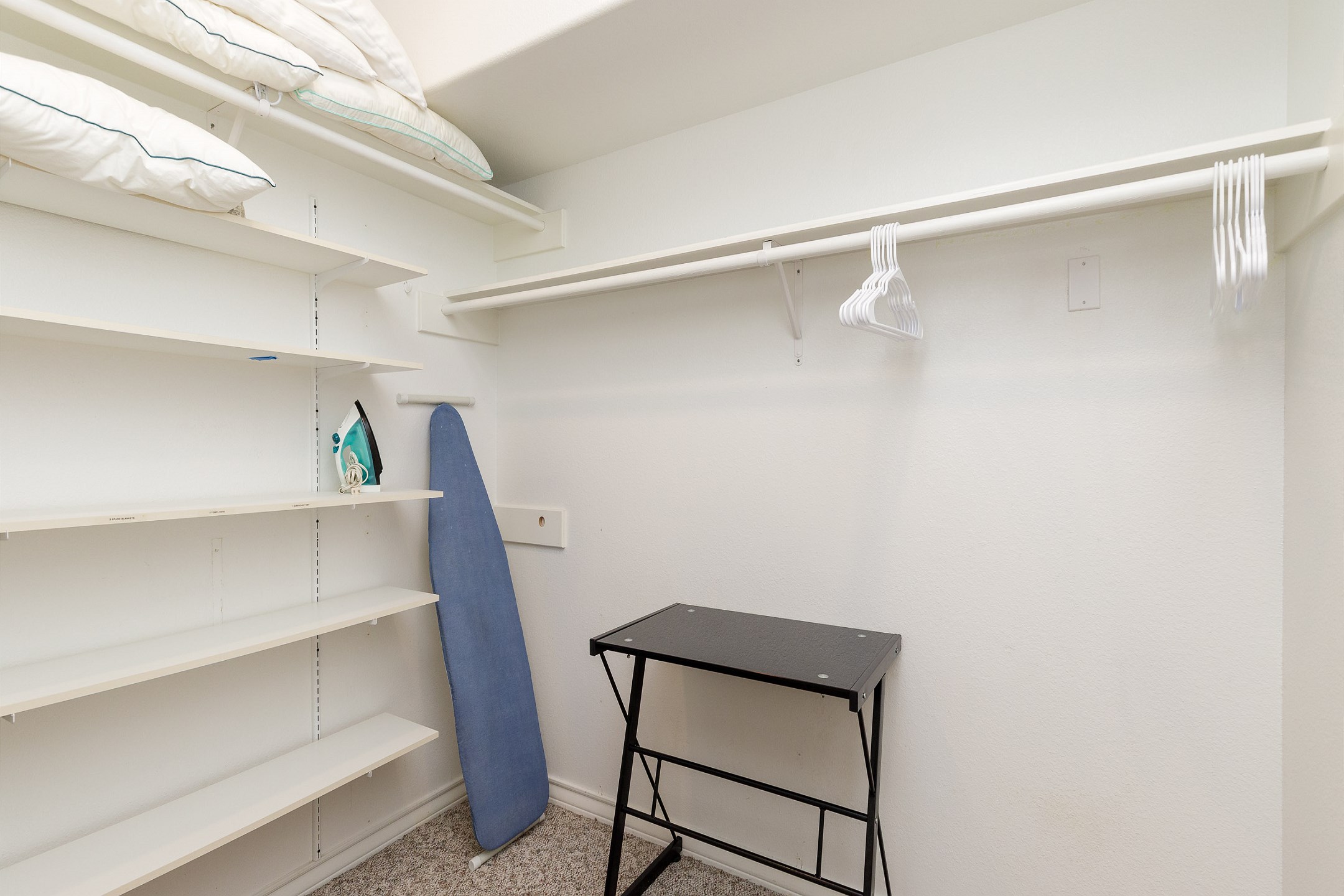 Walk in closet in master bedroom 