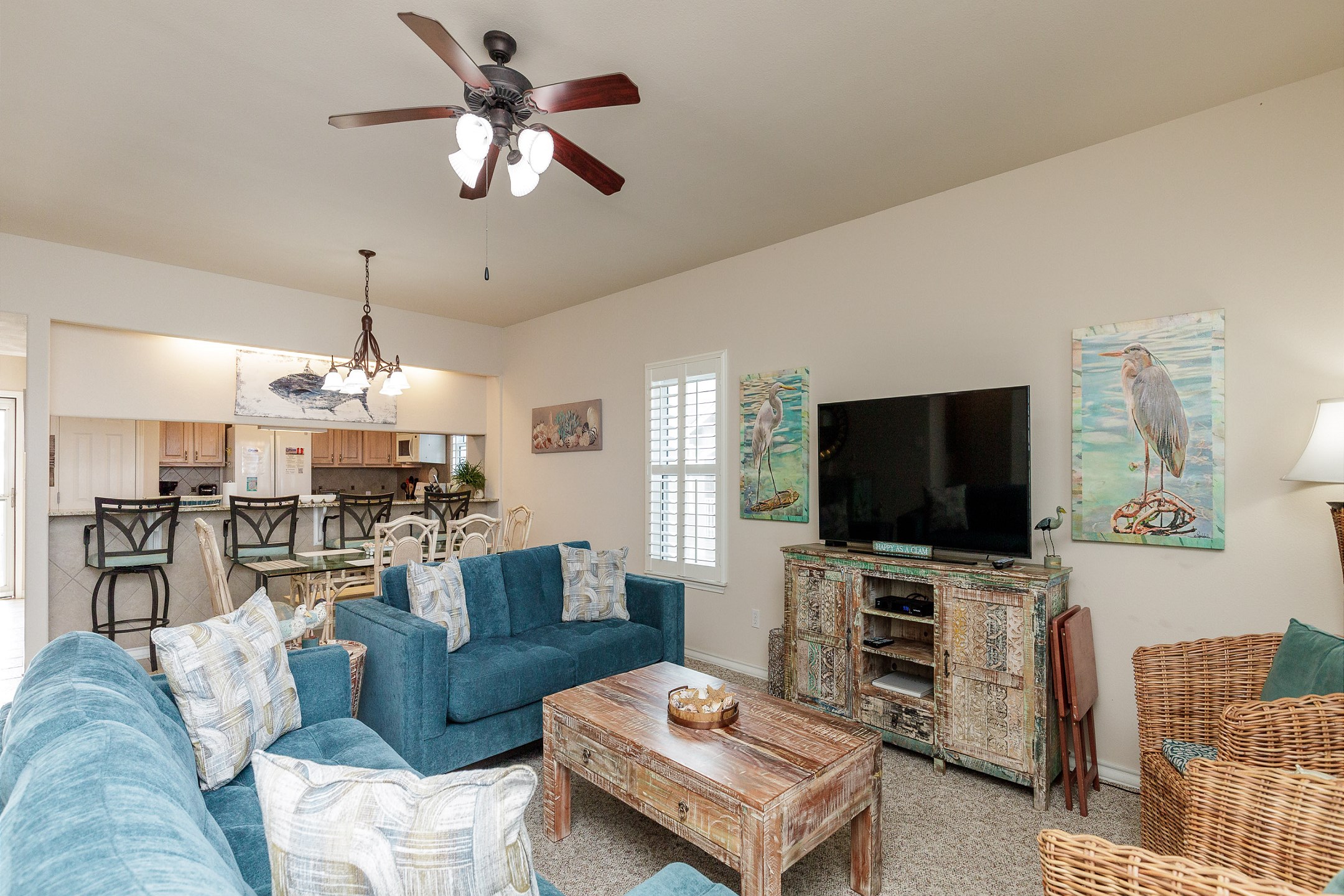 Inviting family hub with seamlessly integrated kitchen, dining, and living areas, perfect for creating lasting memories