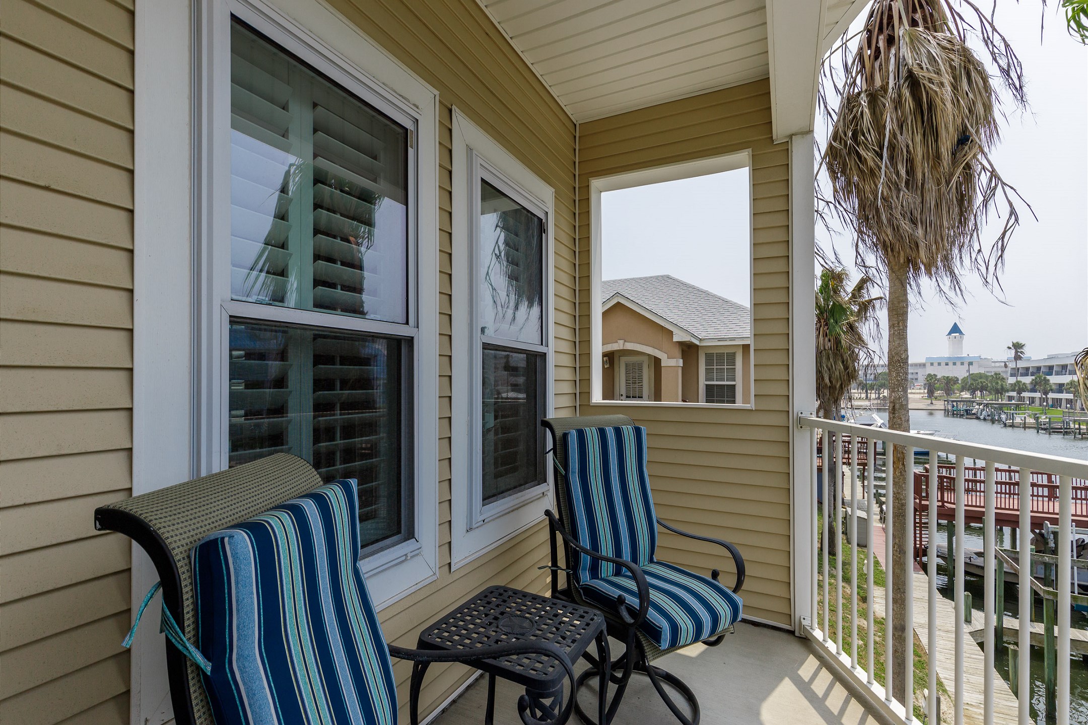 Seating on balcony facing the water