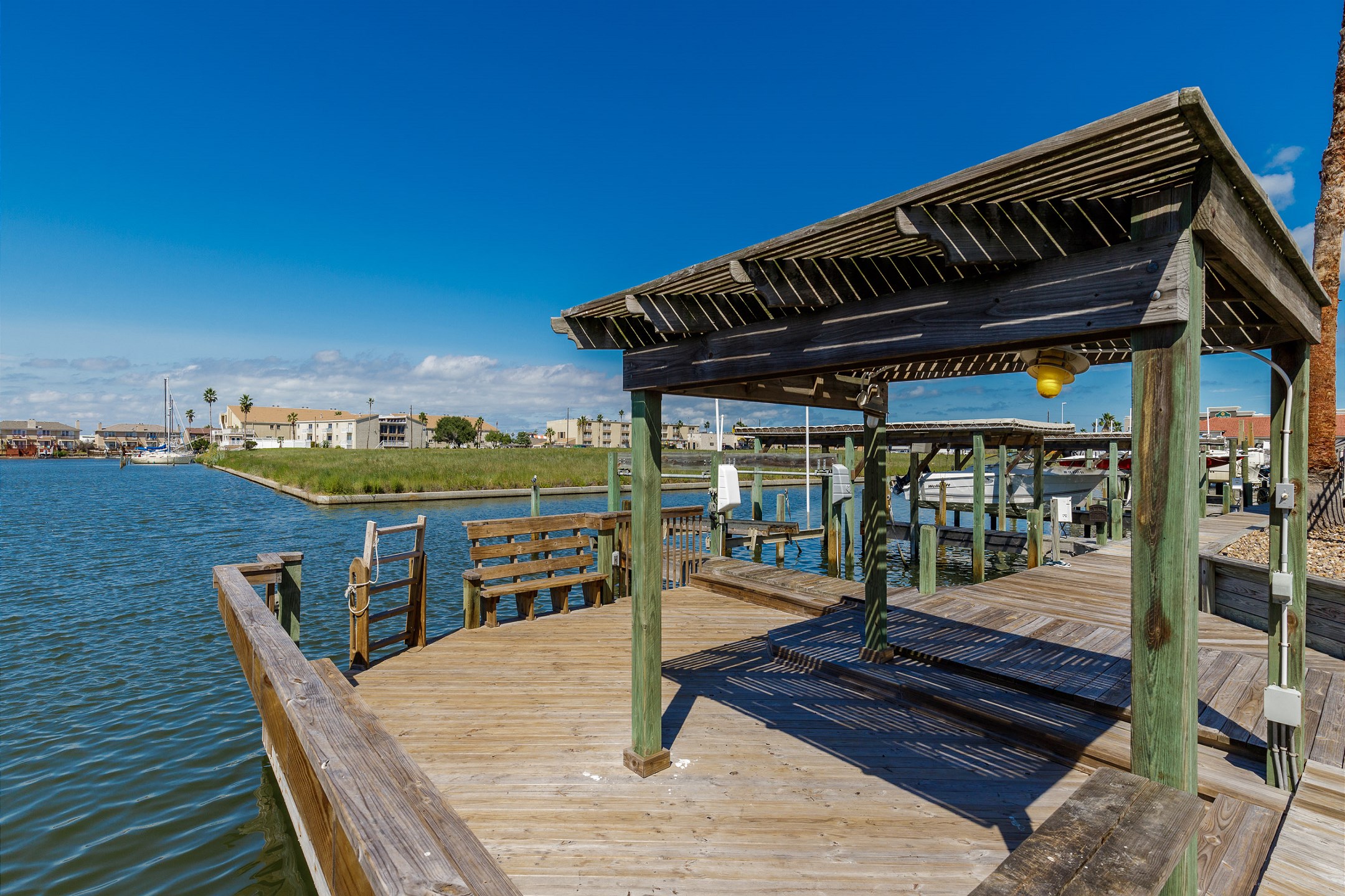 Enjoy complex sitting area with beautiful views perfect for fishing