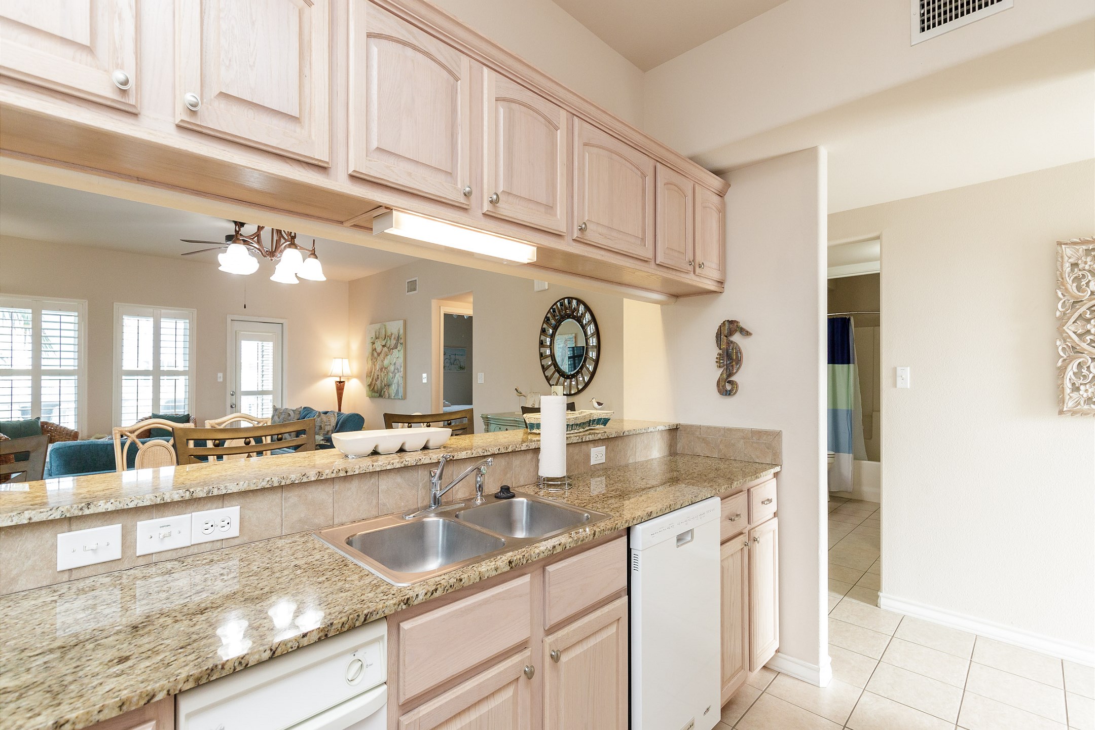 Open concept kitchen that over looks into the living and dining space 