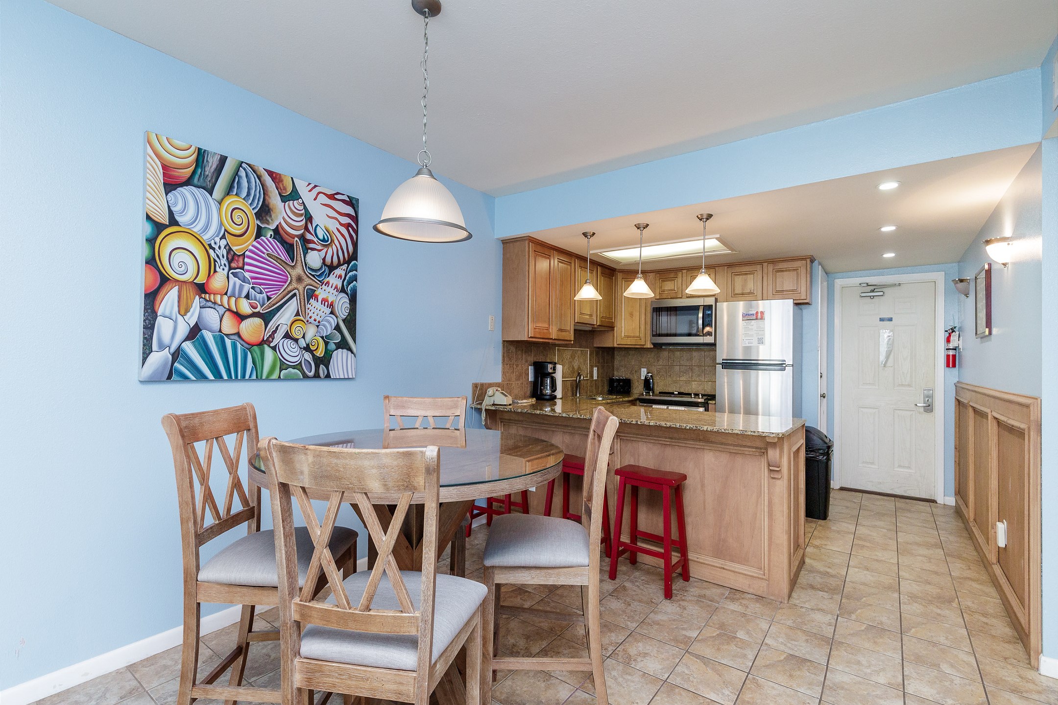 Open-concept layout connecting the dining area to the kitchen