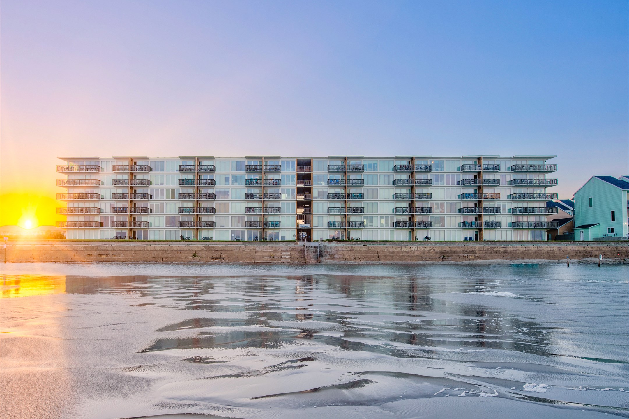 Savor the enchanting coastal sunsets during your Island vacation