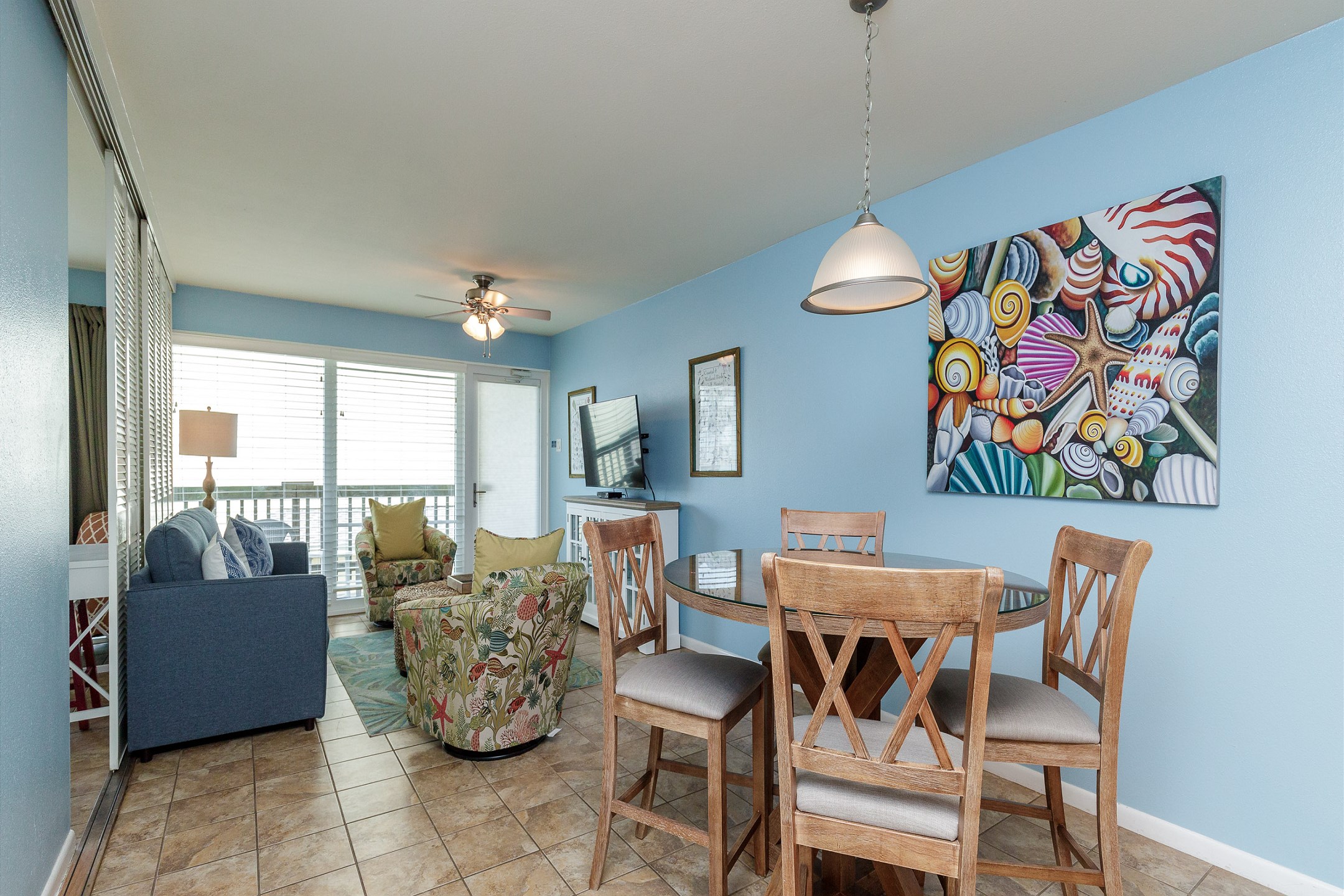 Dining area sits between the kitchen and living area