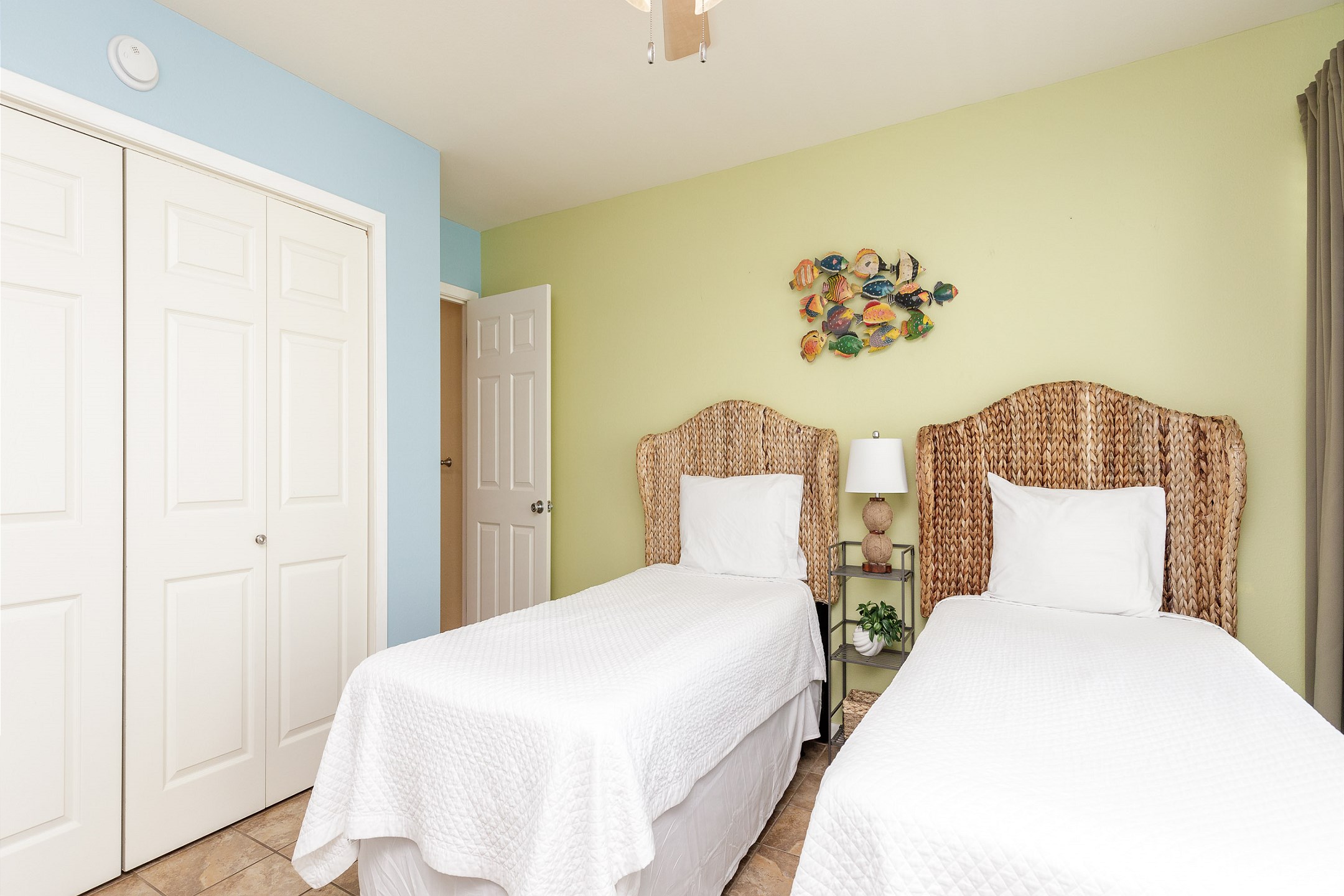 Second bedroom with two twin beds and plenty of closet space 