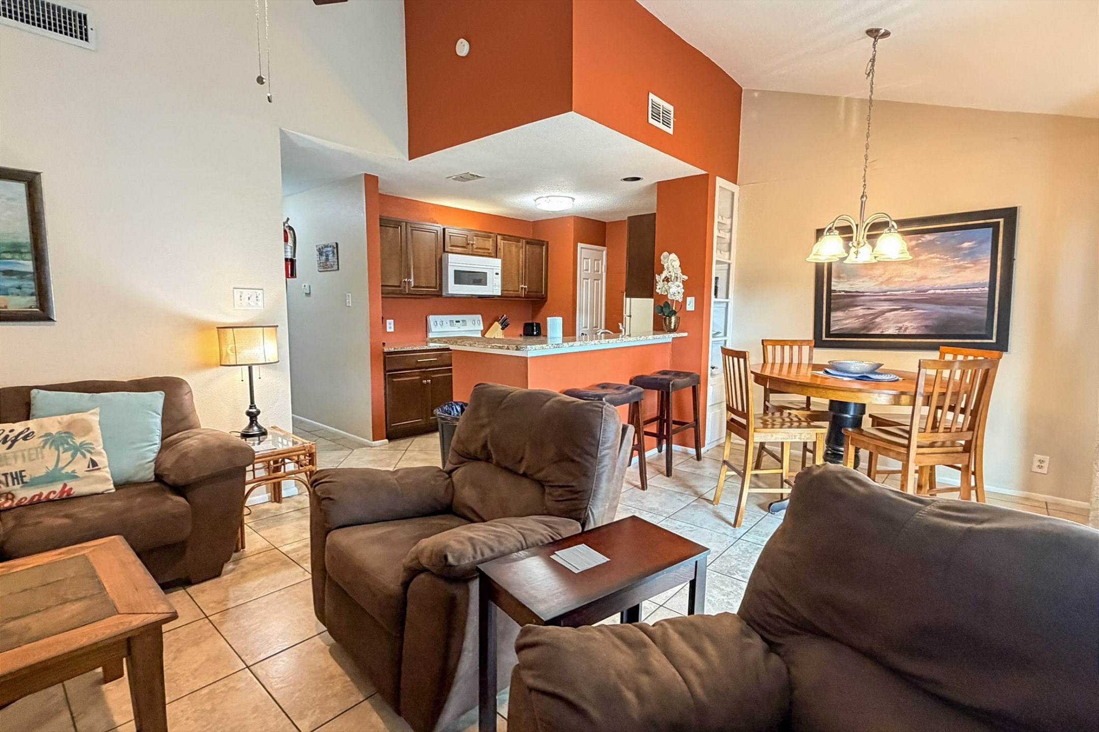 Open layout of the living, dining and kitchen spaces with plenty of seating for everyone 