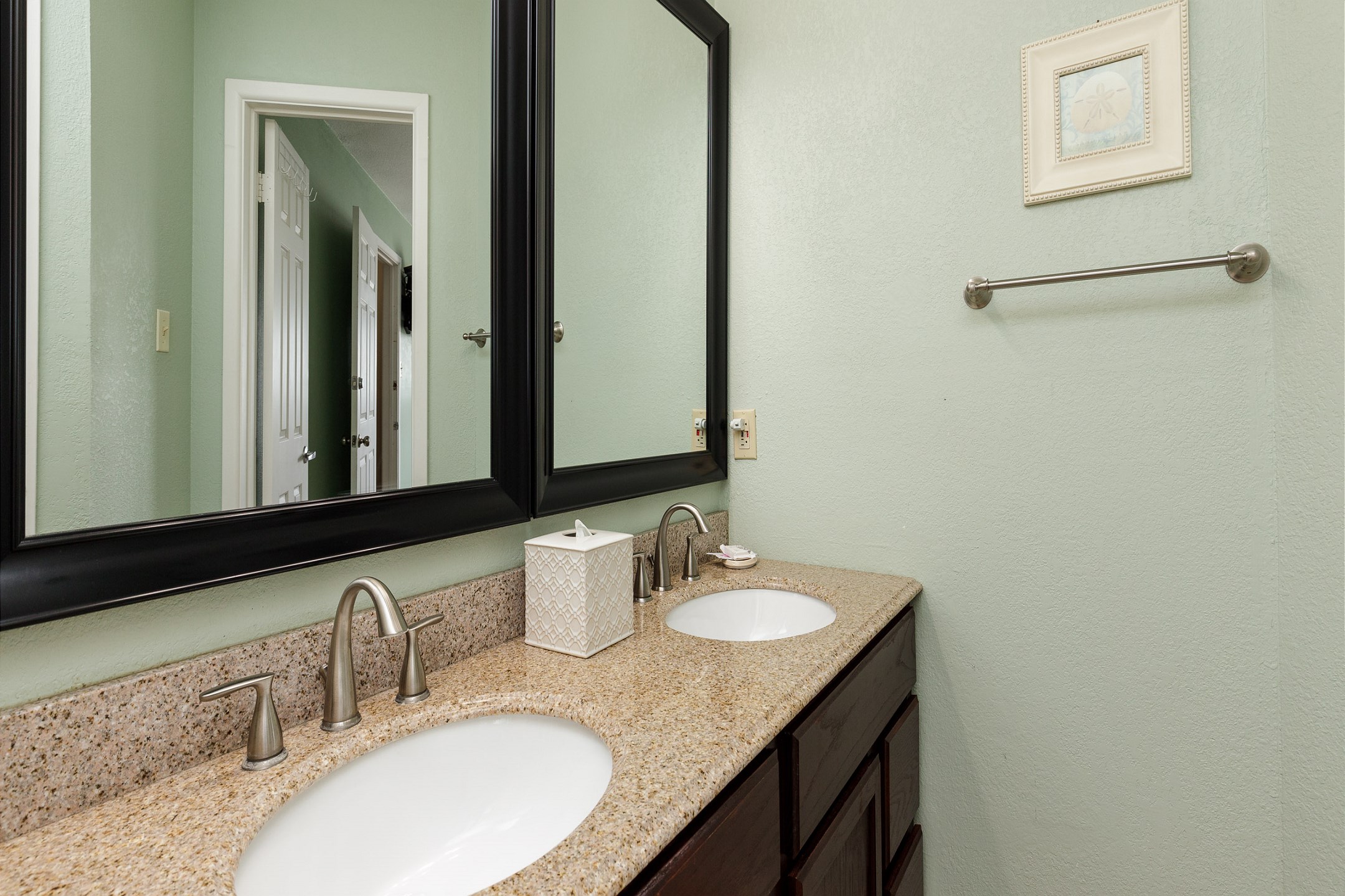 Master bathroom with double sinks and plenty of storage
