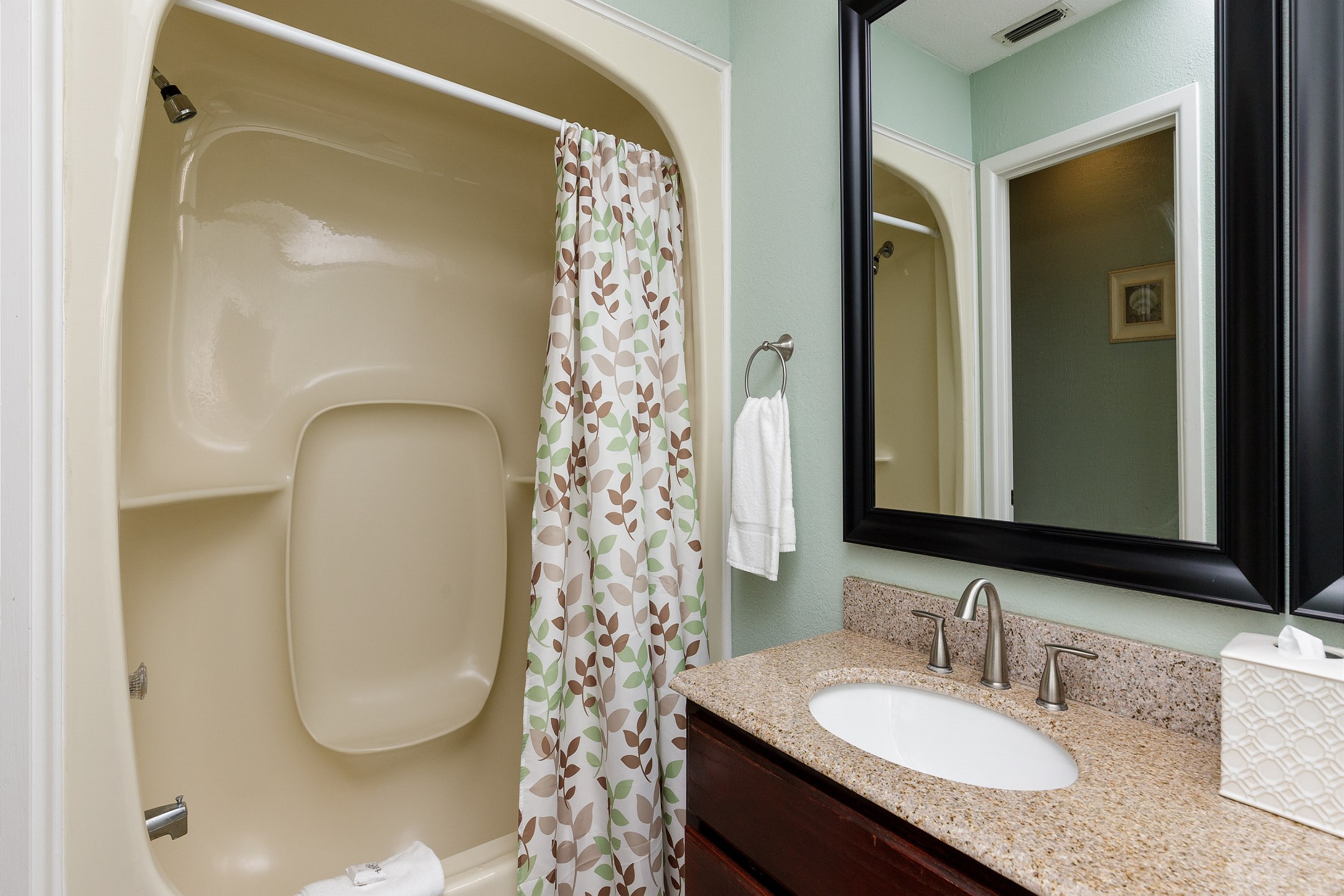 Master bathroom with tub and shower 